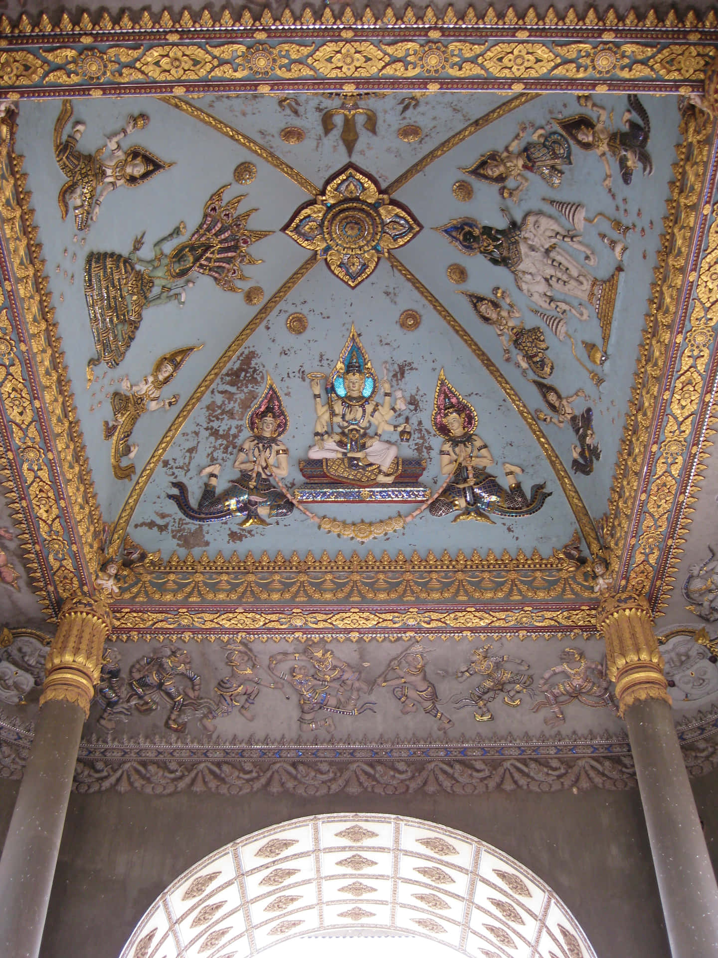 Majestic Ceiling Artistry of Pataxui War Monument in Laos Wallpaper