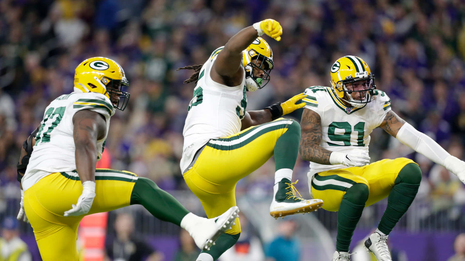 Celebrating Green Bay Packers With Kenny Clark Wallpaper