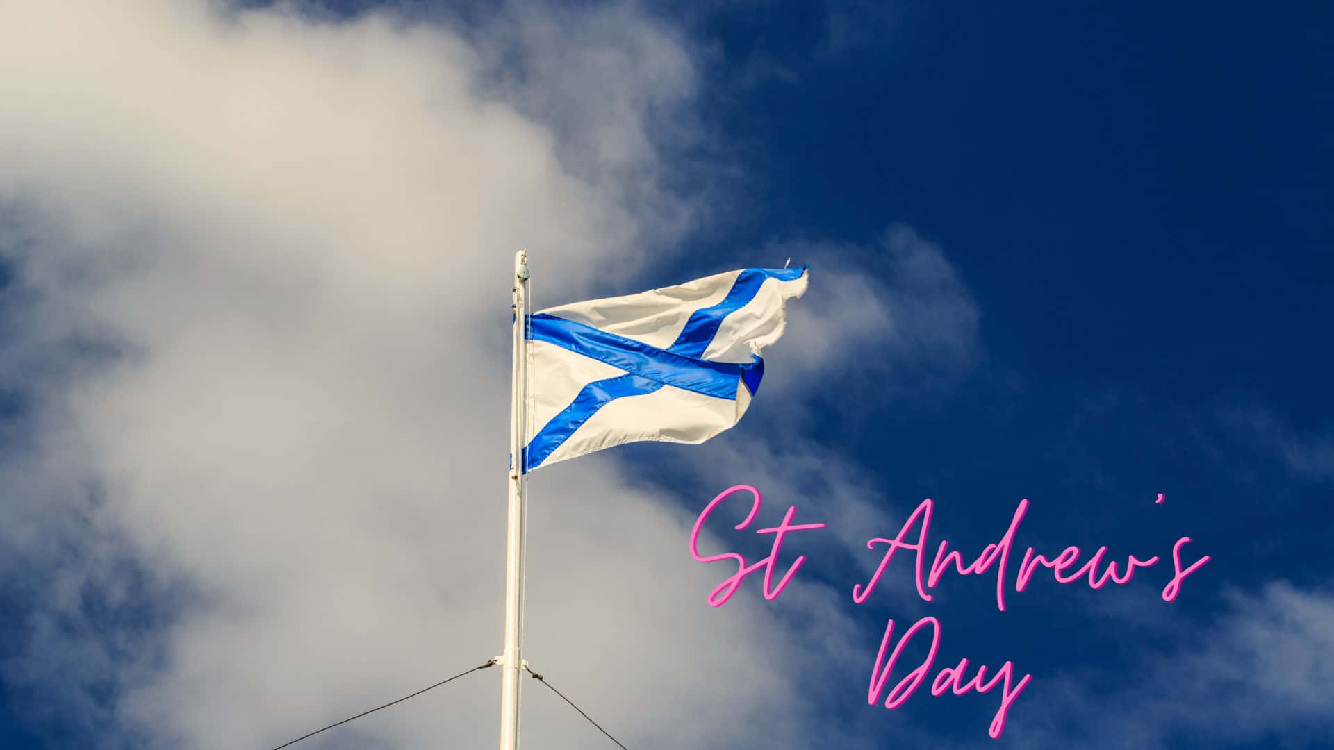 Celebrating St Andrew's Day With Traditional Tartan And Saltire Flag Wallpaper