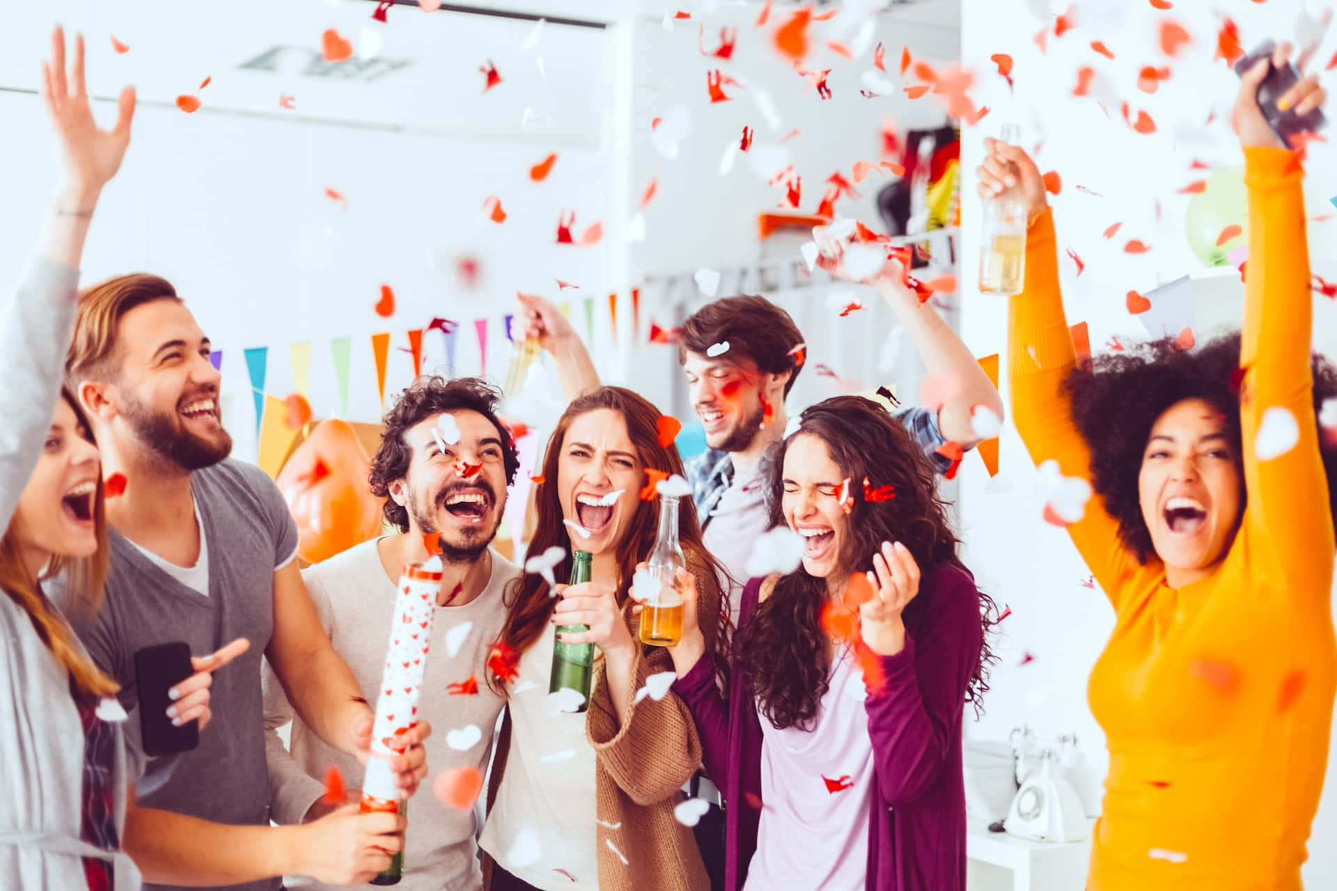 A Group Of People Celebrating A Party