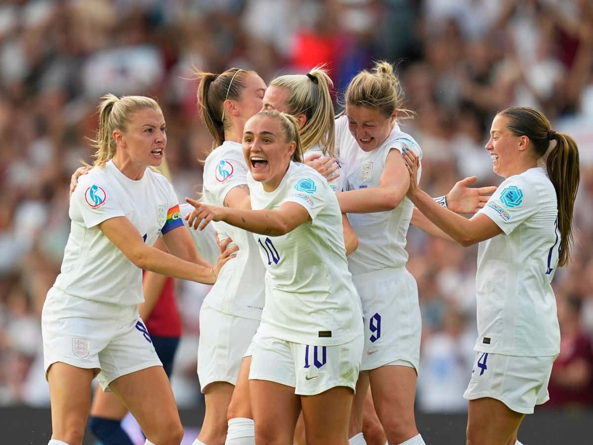 Celebratory Moment Womens Soccer Team Wallpaper