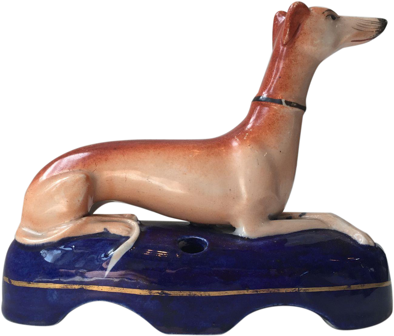 Ceramic Greyhound Figurineon Blue Base PNG