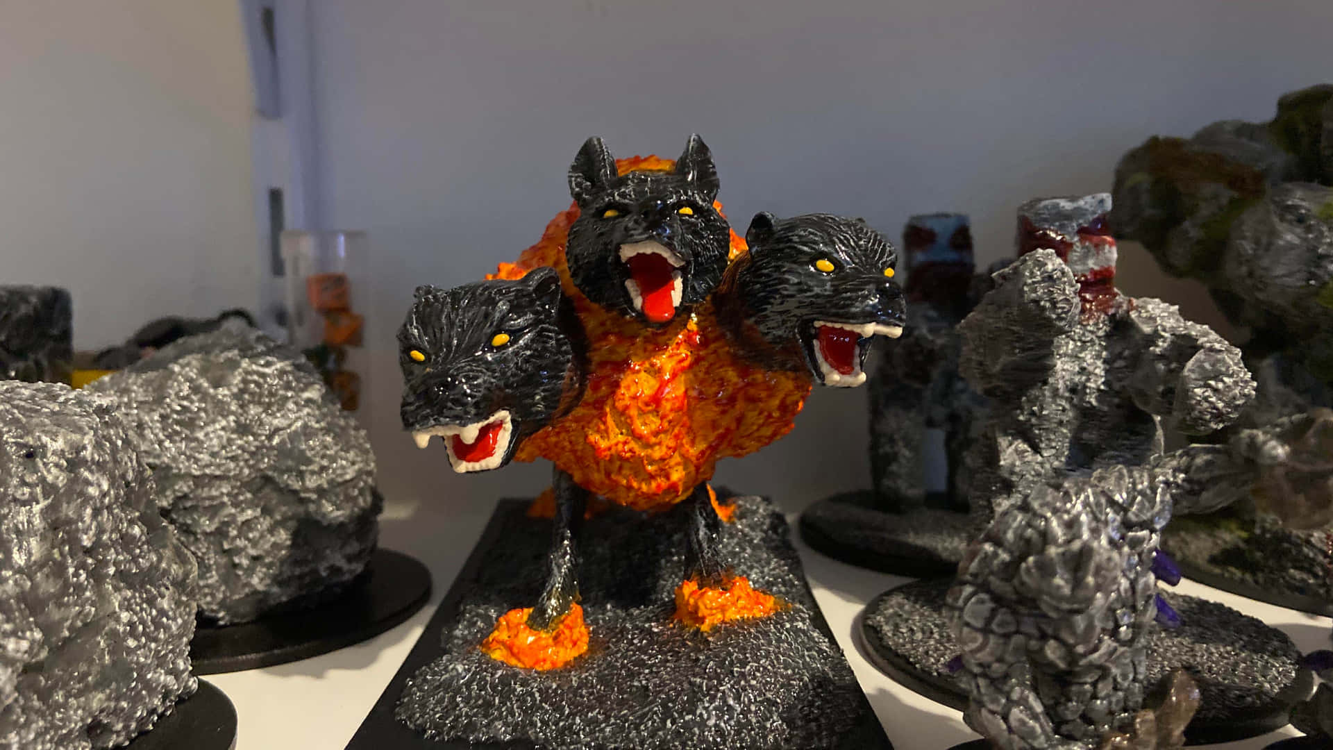 A Display Of Figurines With Fire And Flames