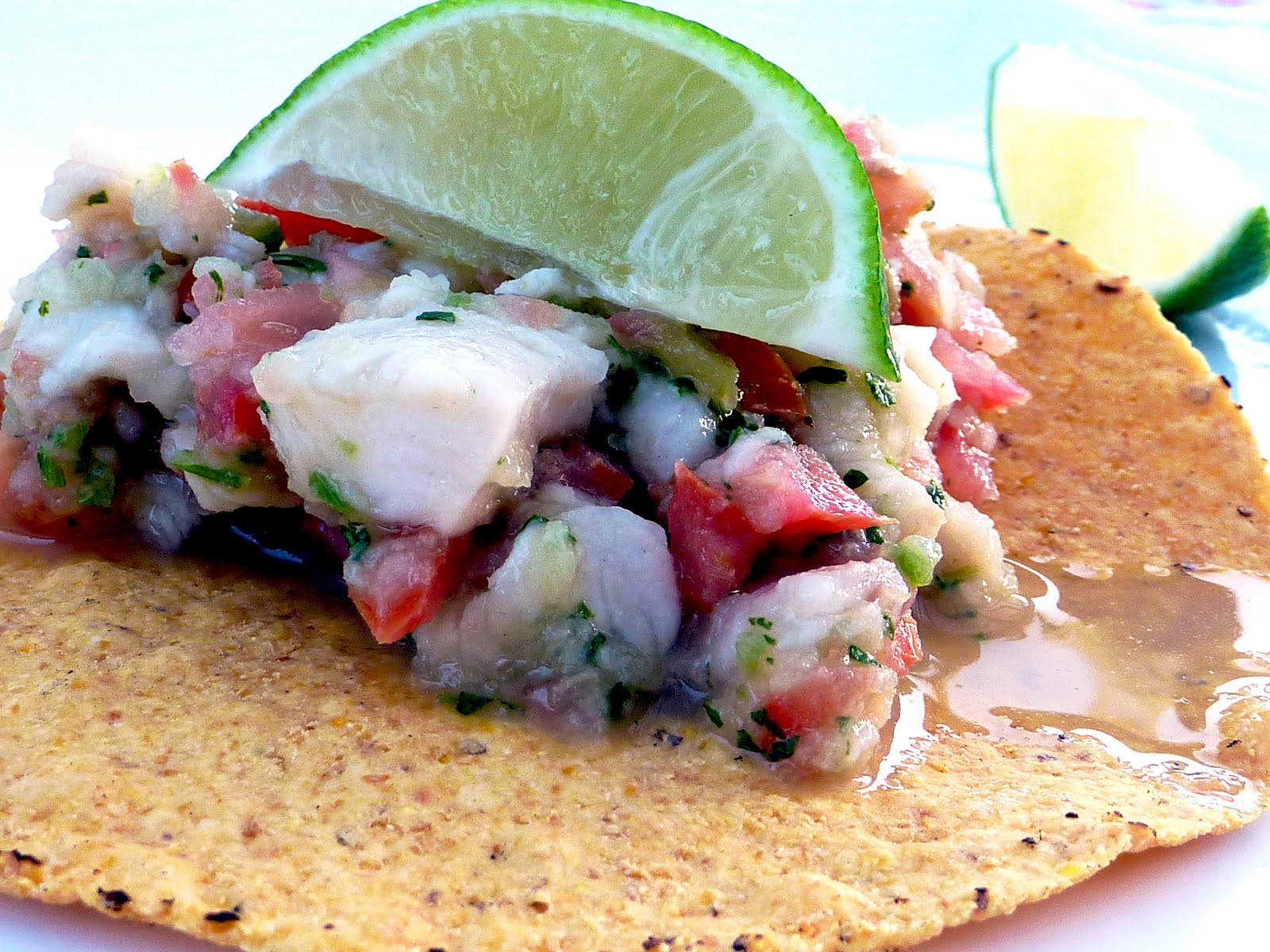 Ceviche Tostadas With Large Slice Of Lime Wallpaper