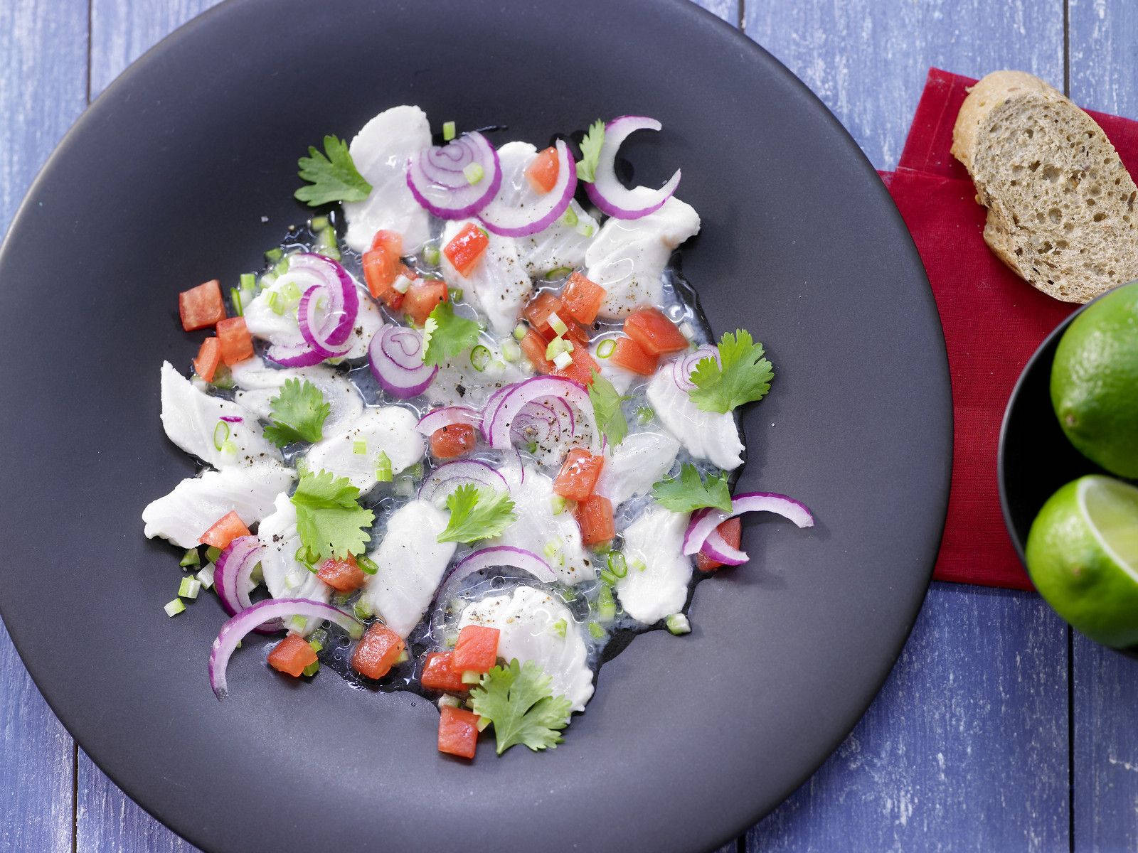 Ceviche With Onions On Black Plate Wallpaper