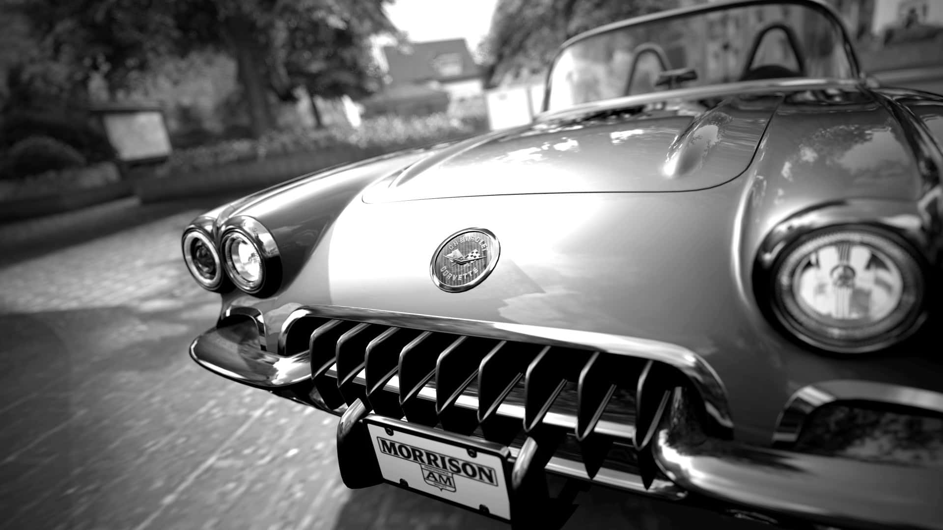 A Black And White Photo Of A Classic Car