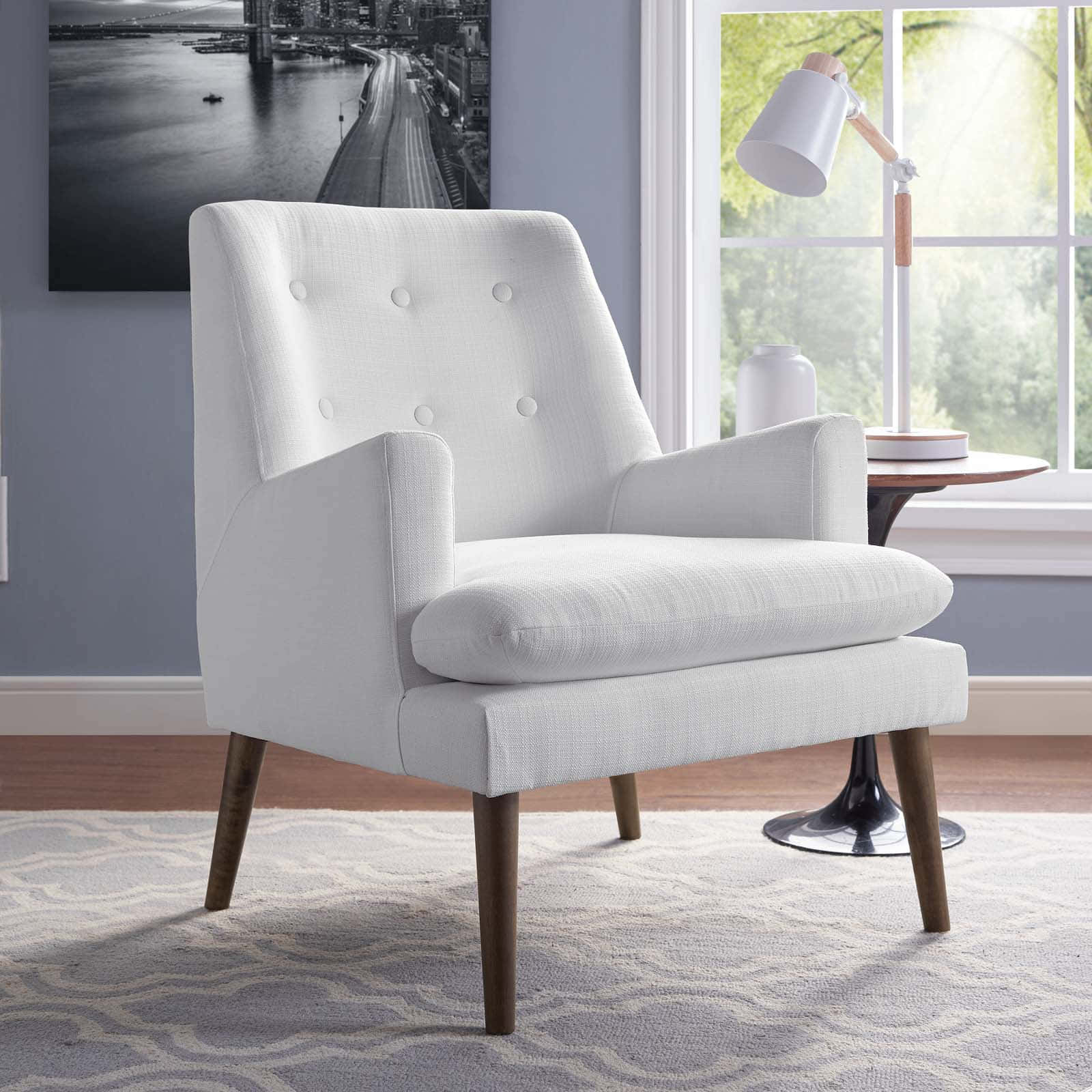 A White Chair In A Room With A Large Window Wallpaper