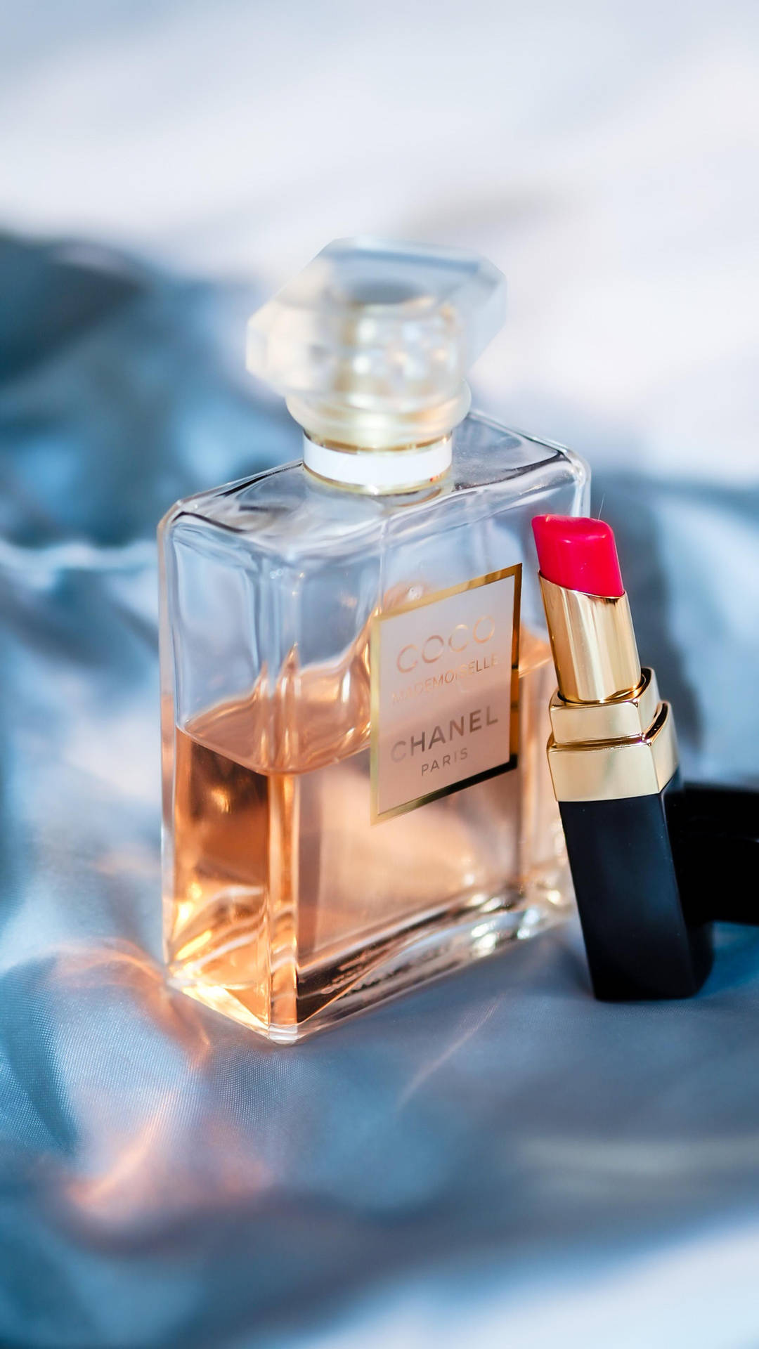 Chanel Aesthetic Perfume And Lipstick Background