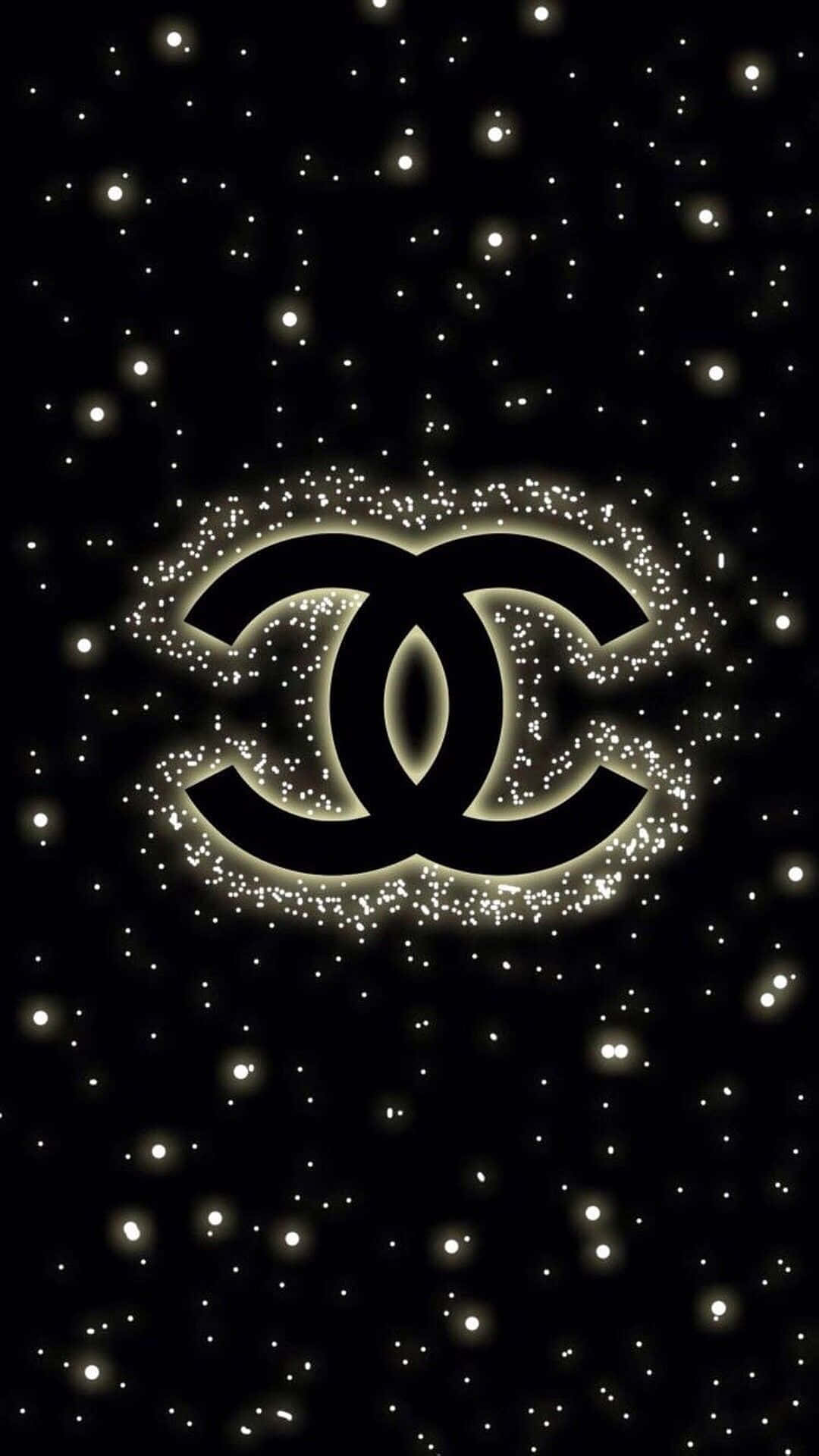 Detikoniske Chanel-logo Står Som Et Symbol På Tidløs Luksus Og Stil.