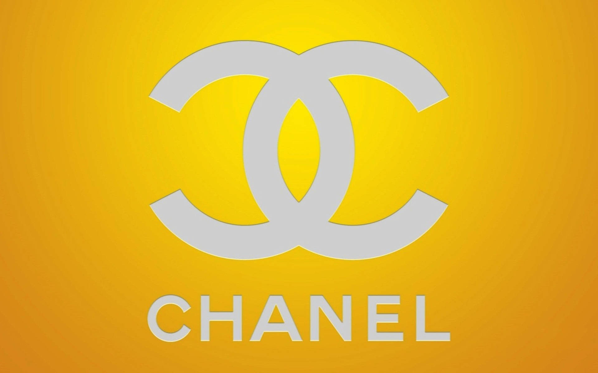 Chanel Logo Yellow Gradient Wallpaper
