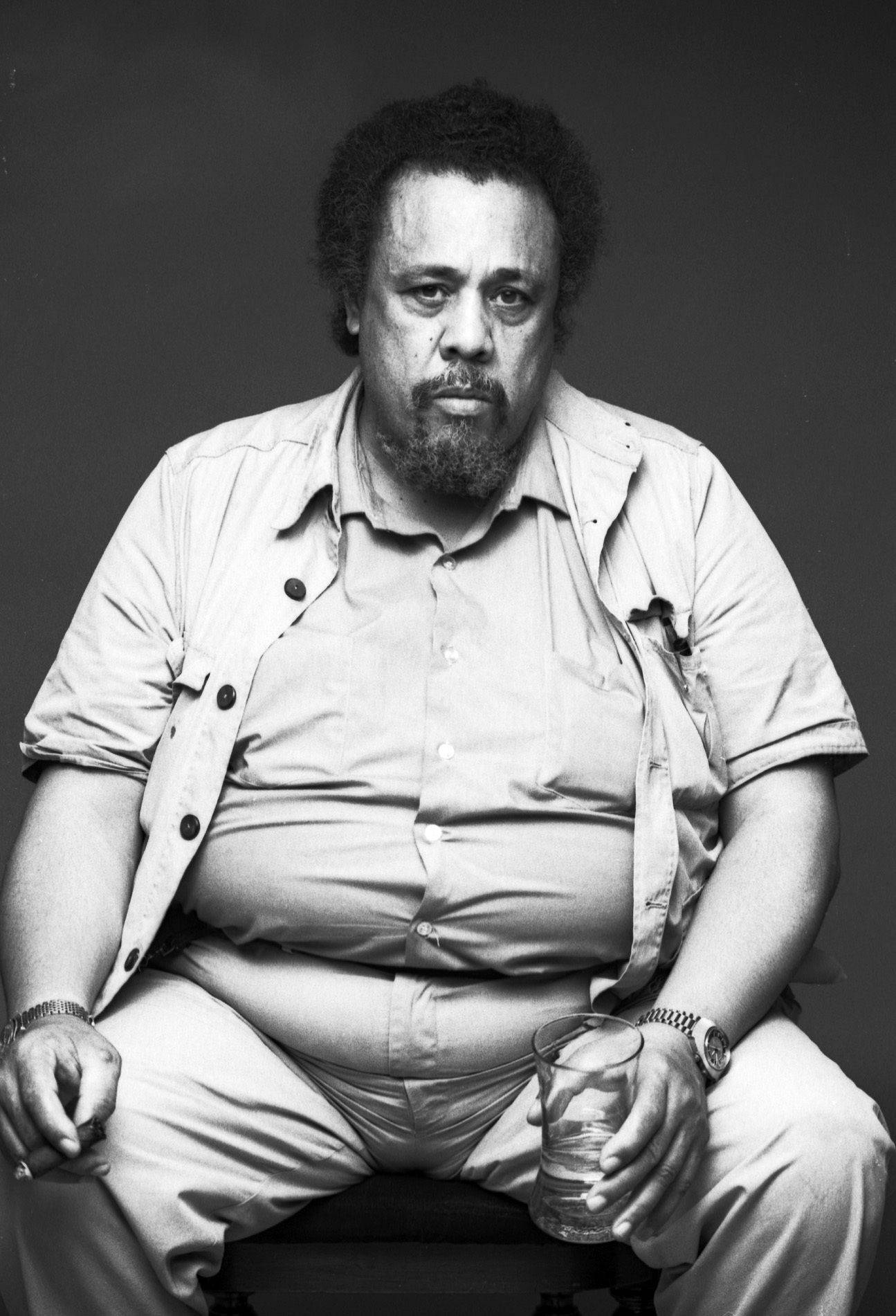Charles Mingus Holding A Glass Wallpaper