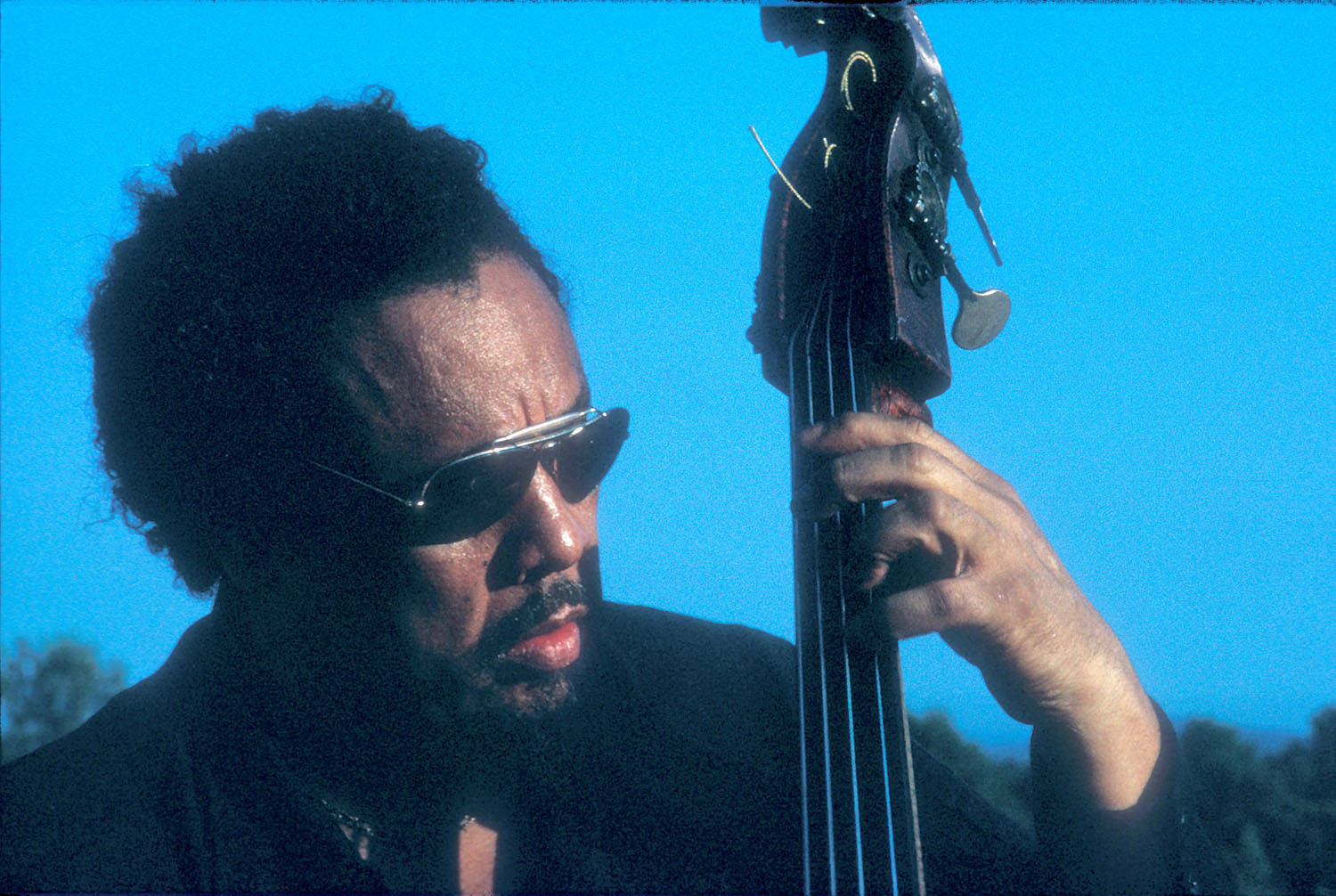 Charles Mingus On A Blue Sky Background Wallpaper