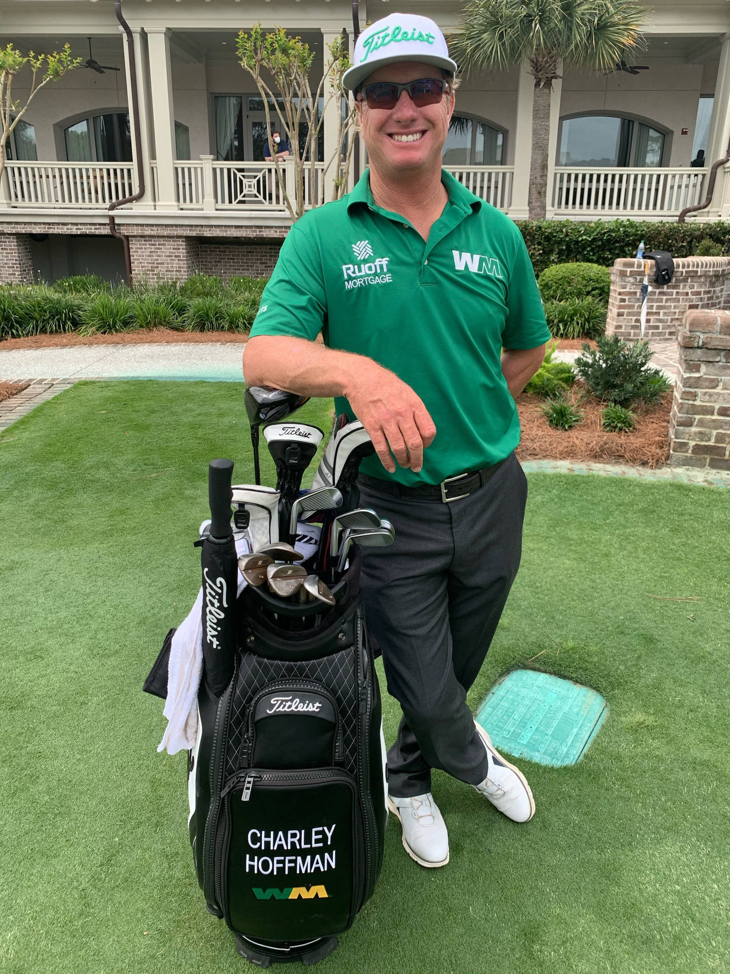Charley Hoffman Posing With Golf Bag Wallpaper