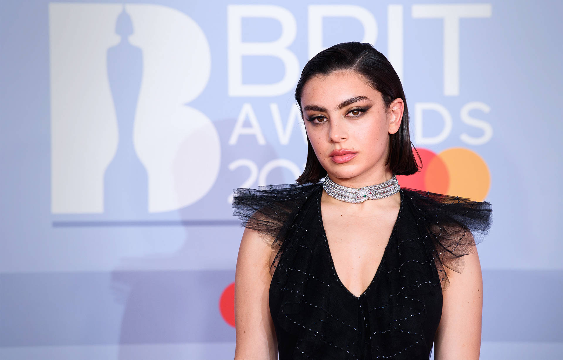 Charli Xcx Brit Red Carpet Outfit Background