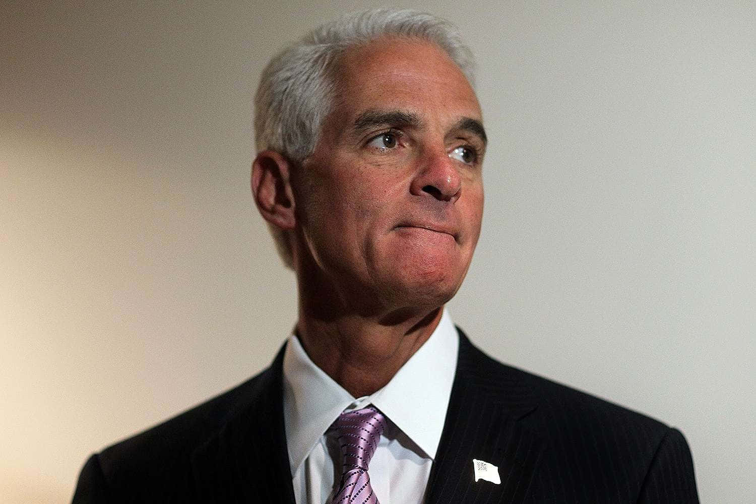 Former Governor Charlie Crist appearing worried during a public event Wallpaper