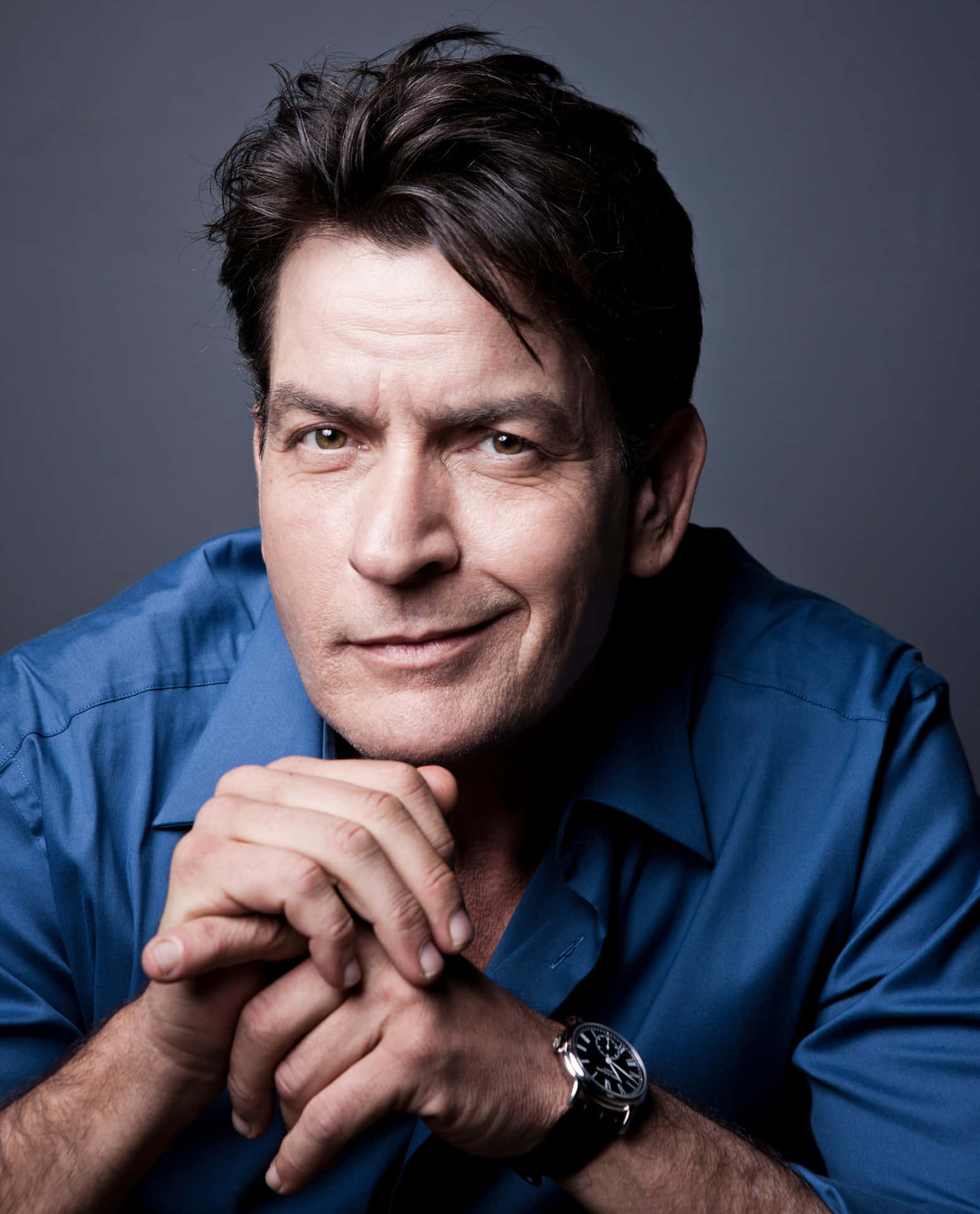 "Hollywood Star, Charlie Sheen In-depth Reflection" Wallpaper