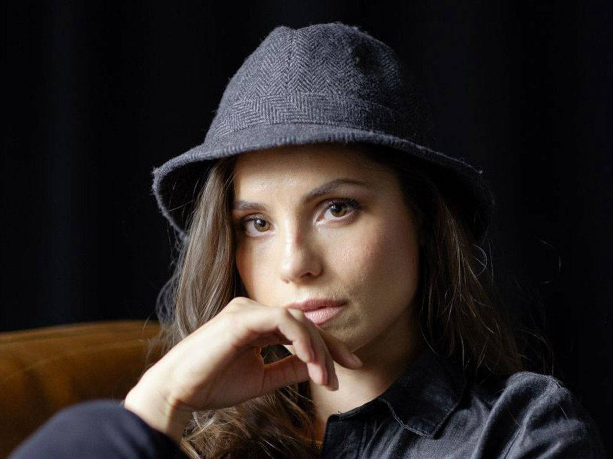 Charlotte Riley With A Cap Wallpaper