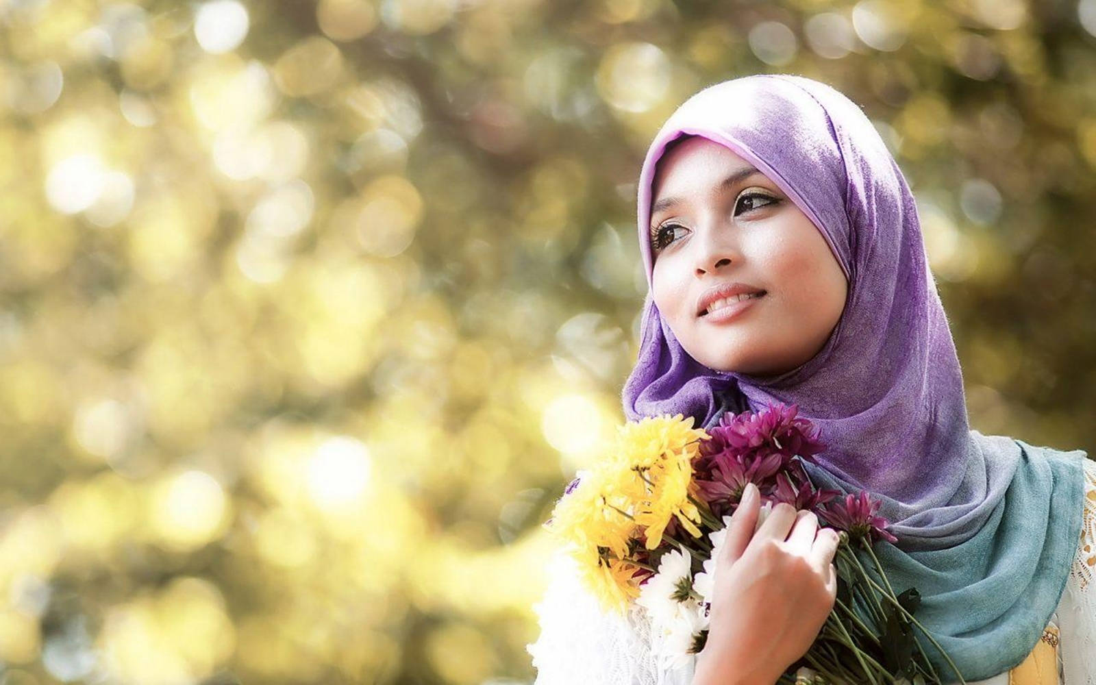 Charming Hijab Girl Holding Flowers