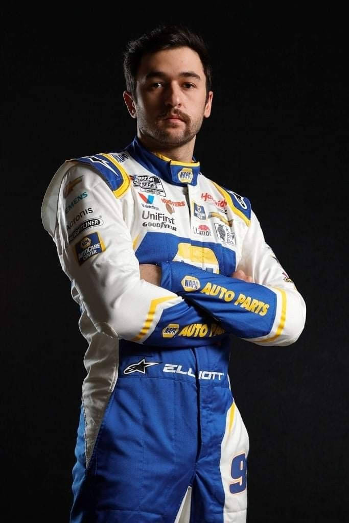 NASCAR Driver Chase Elliott, Arms Crossed on a Black Background Wallpaper