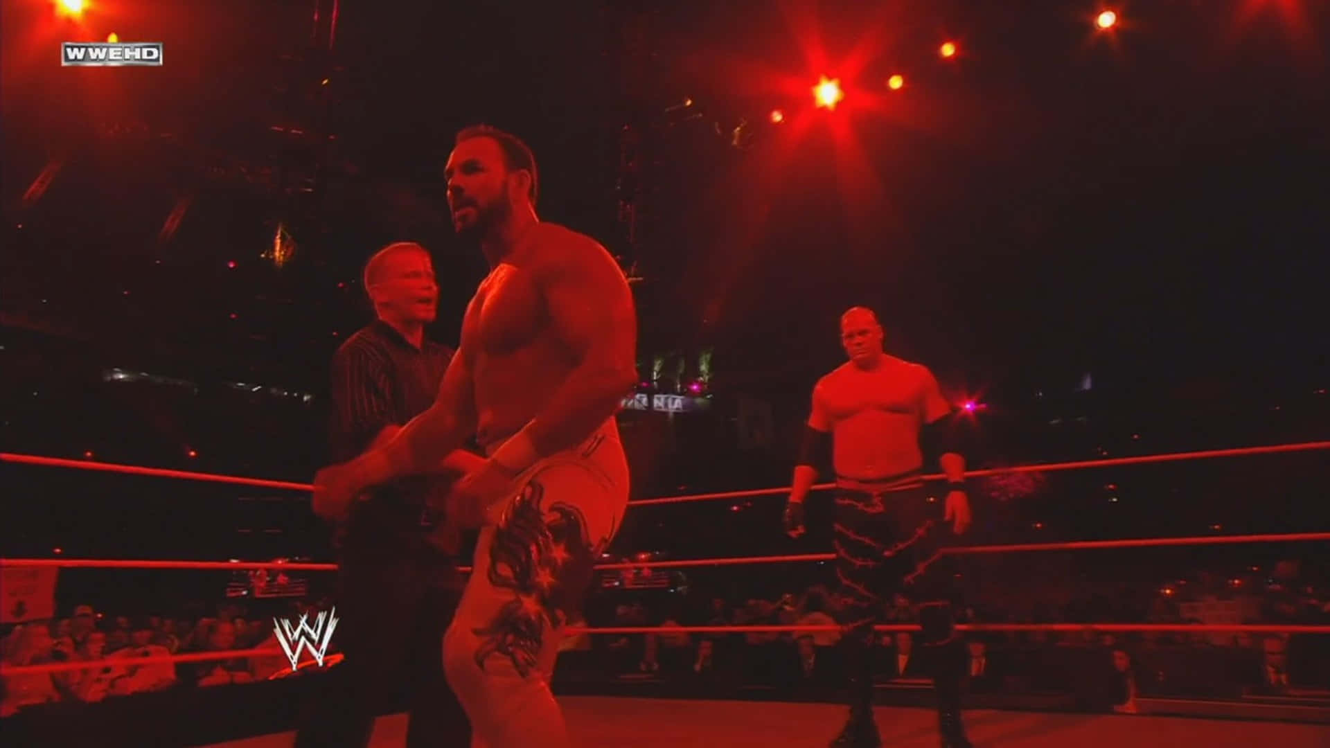 Chavo Guerrero faces off against Cain in an electrifying wrestling match Wallpaper