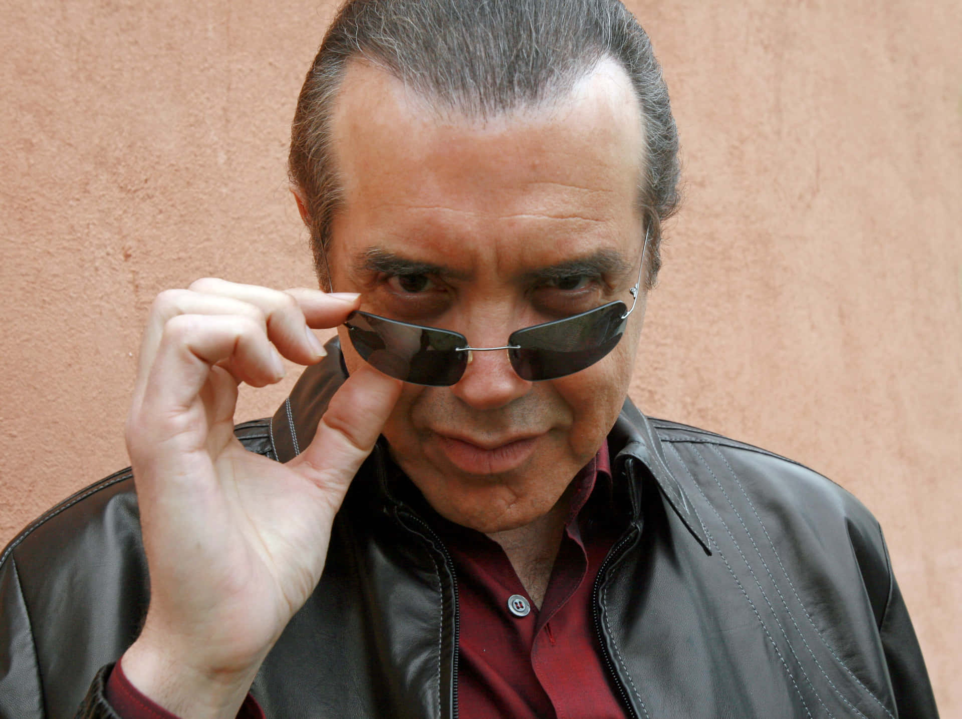 Respected Actor Chazz Palminteri Posing for a Photoshoot Wallpaper