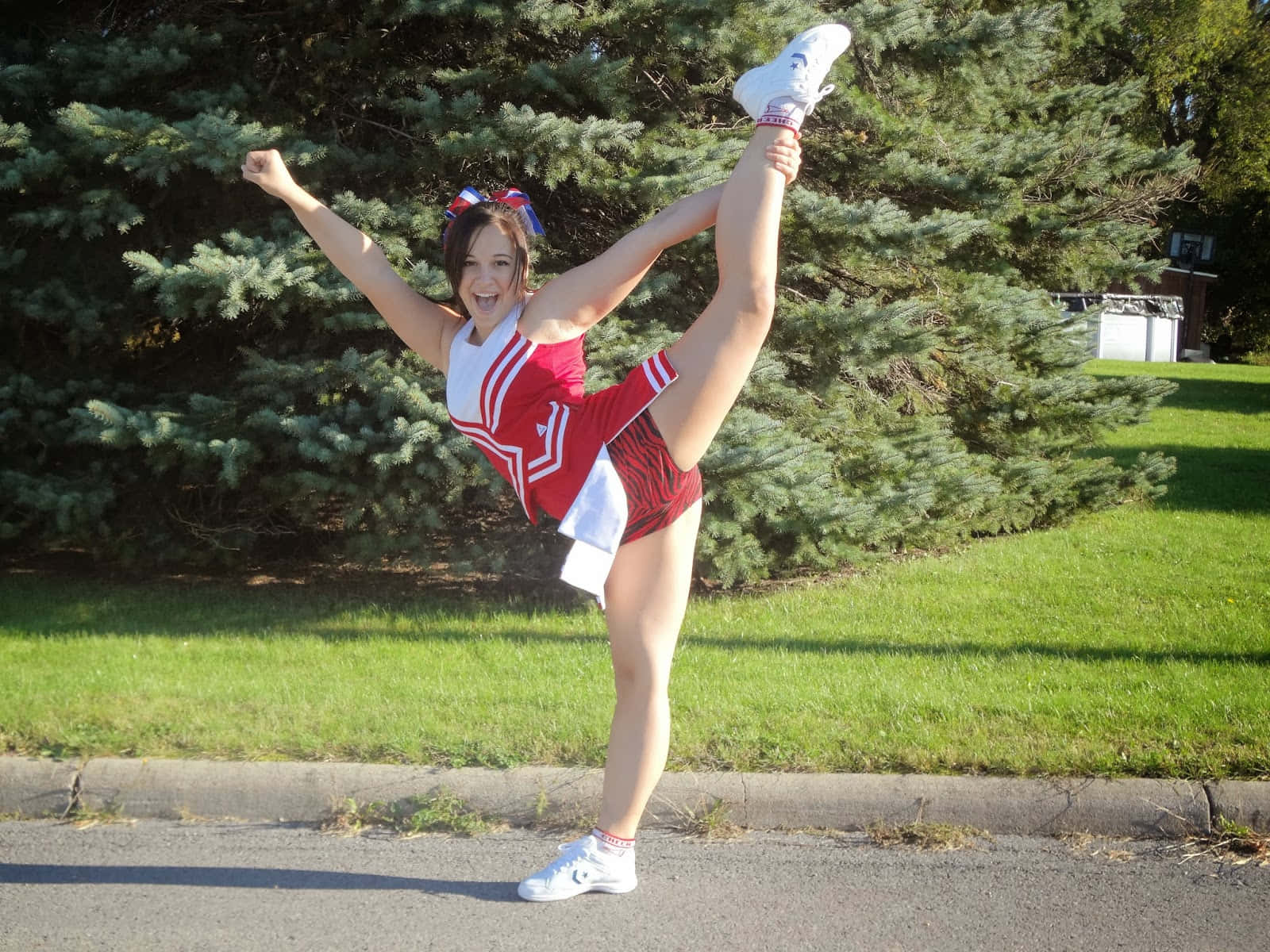 Cheerleader Doing Standing Split Picture