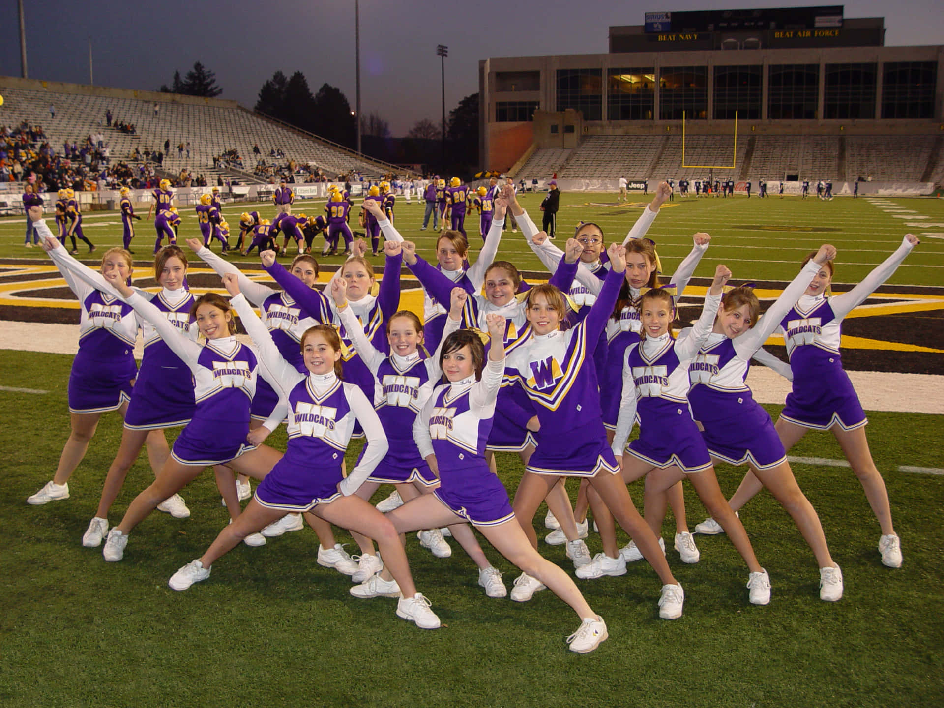 Cheerleaders Posing For Picture