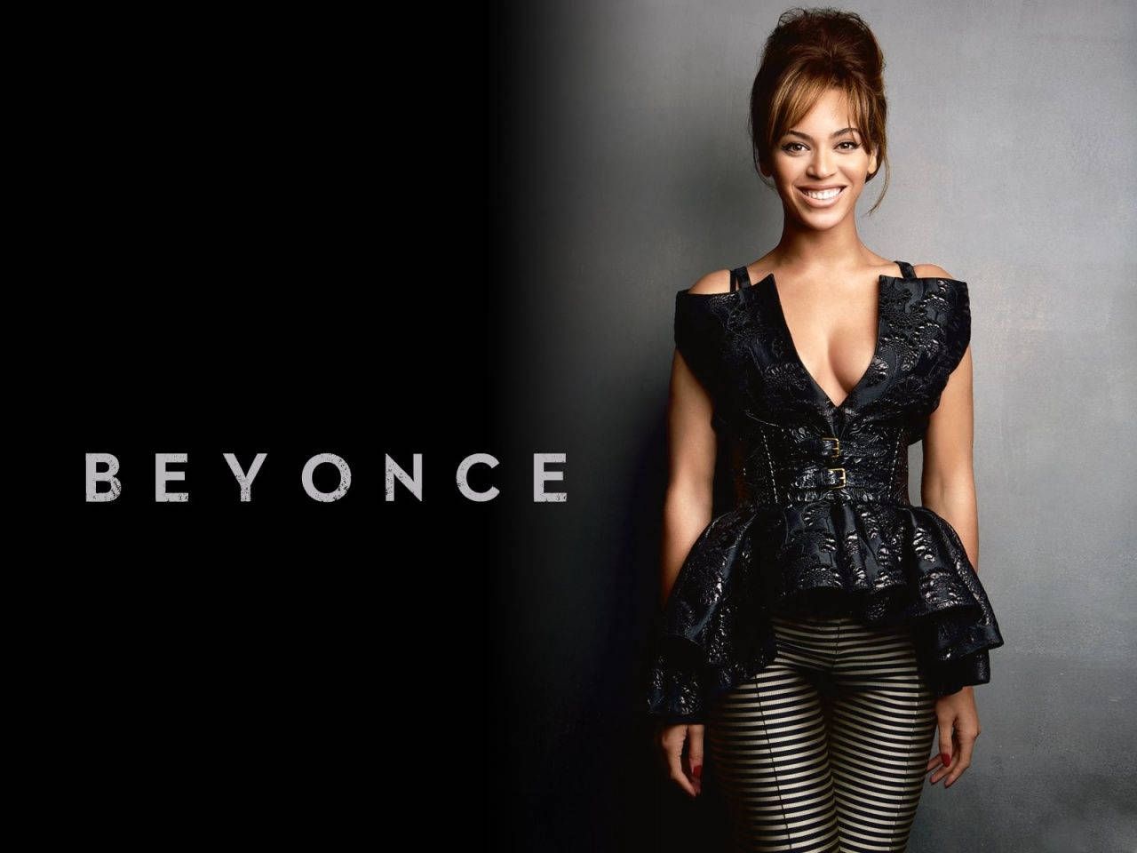 Cheerful Beyonce In Black Outfit Background