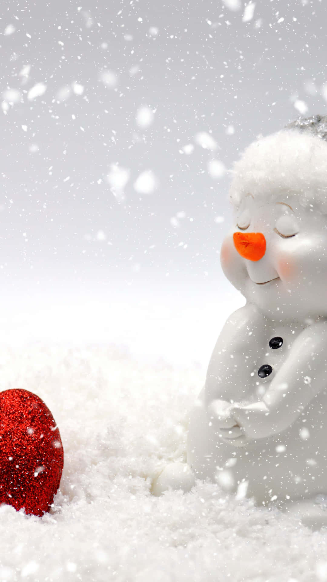 Cheerful_ Snowman_with_ Red_ Ornament.jpg Wallpaper