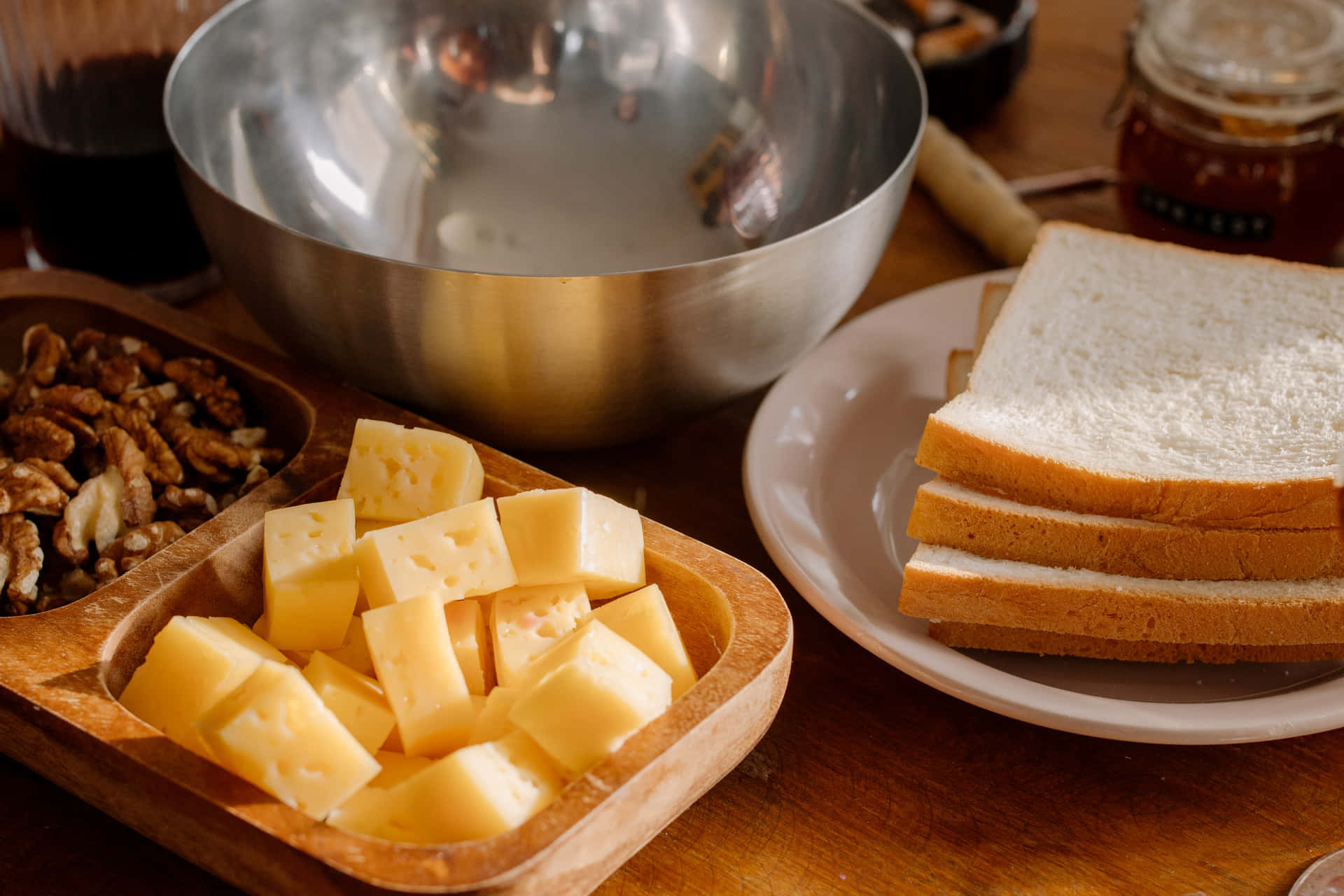 A delectable assortment of various cheeses on a rustic wooden table