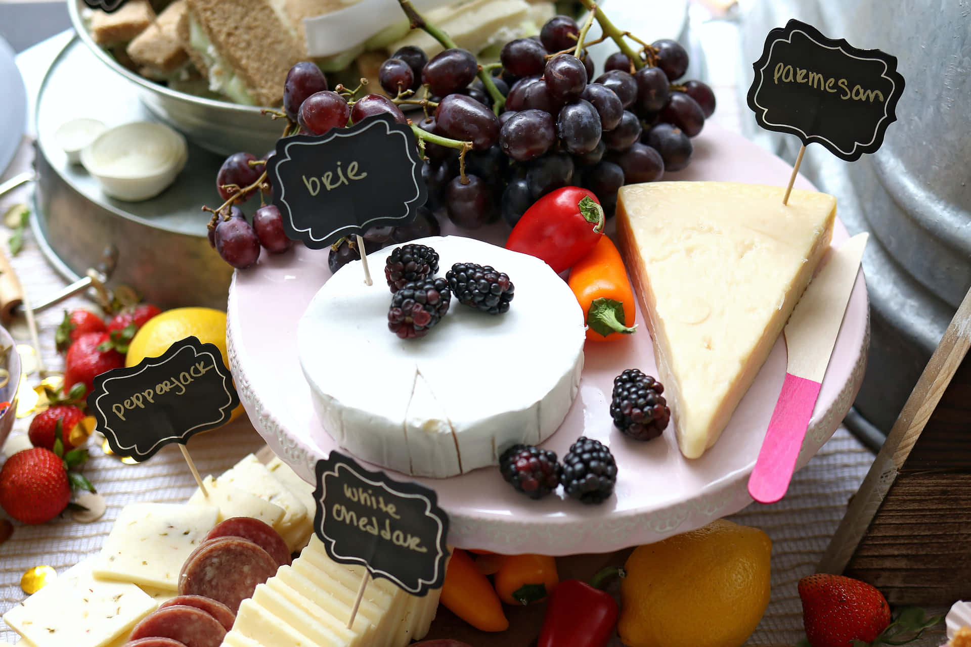 Assortment of various types of cheese on a wooden board