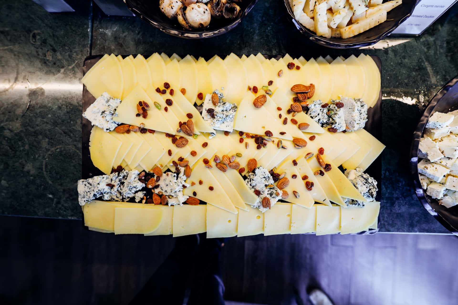 A Gourmet Cheese Platter on Wooden Board