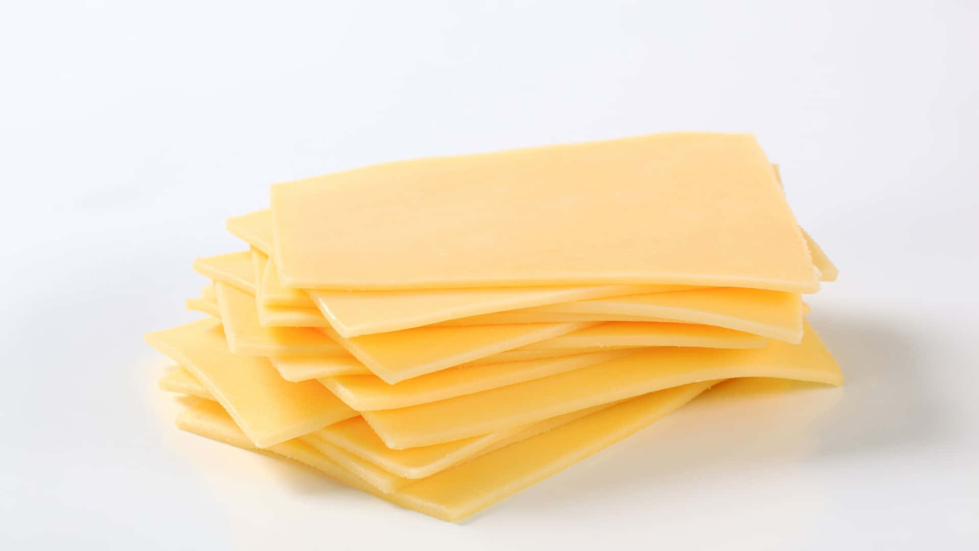 Einhaufen Käse Auf Einem Weißen Hintergrund