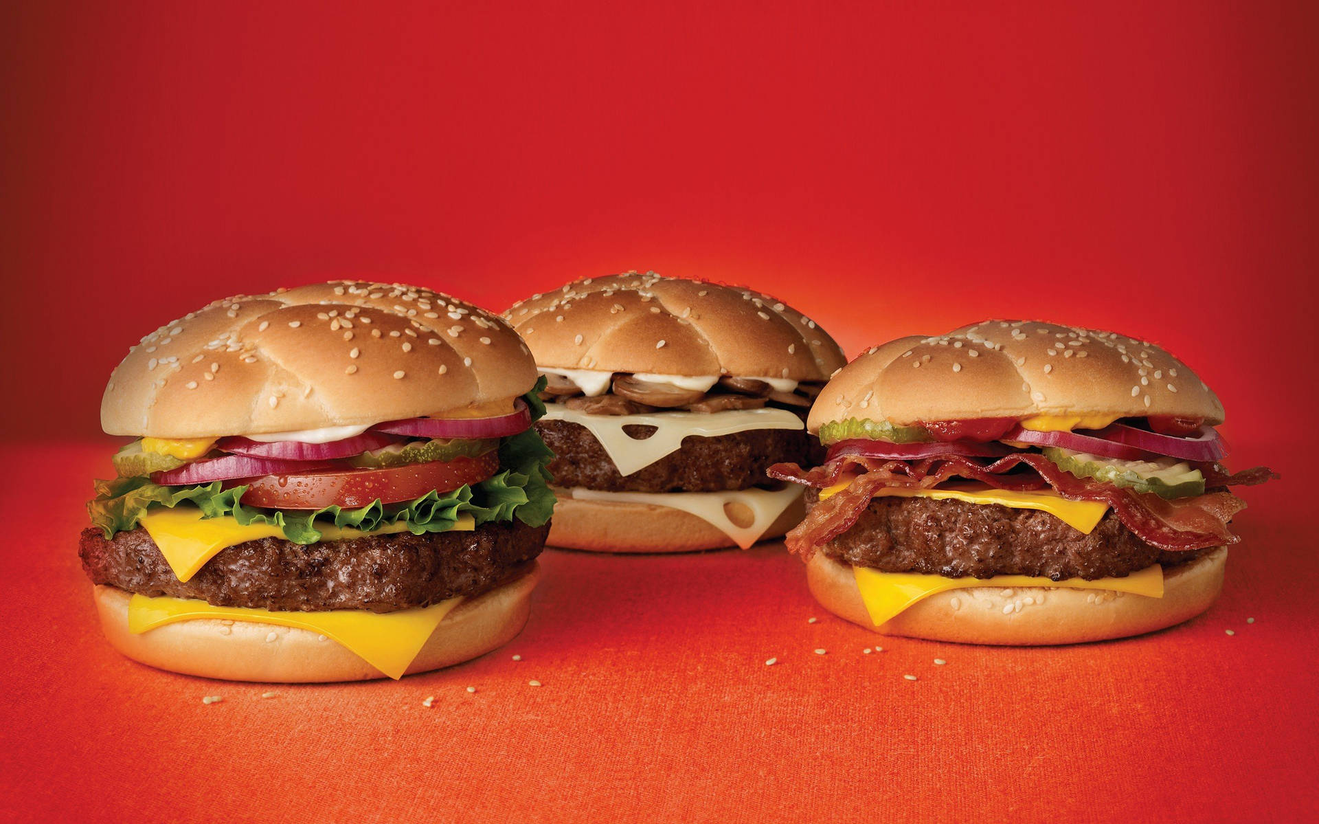 Cheeseburgere med en oransje bakgrunn Wallpaper
