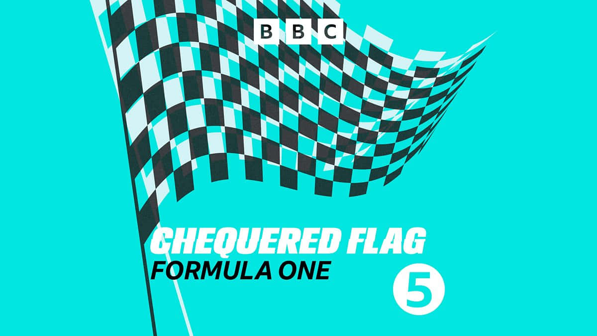 Chequered flag waving at finish line of a race Wallpaper