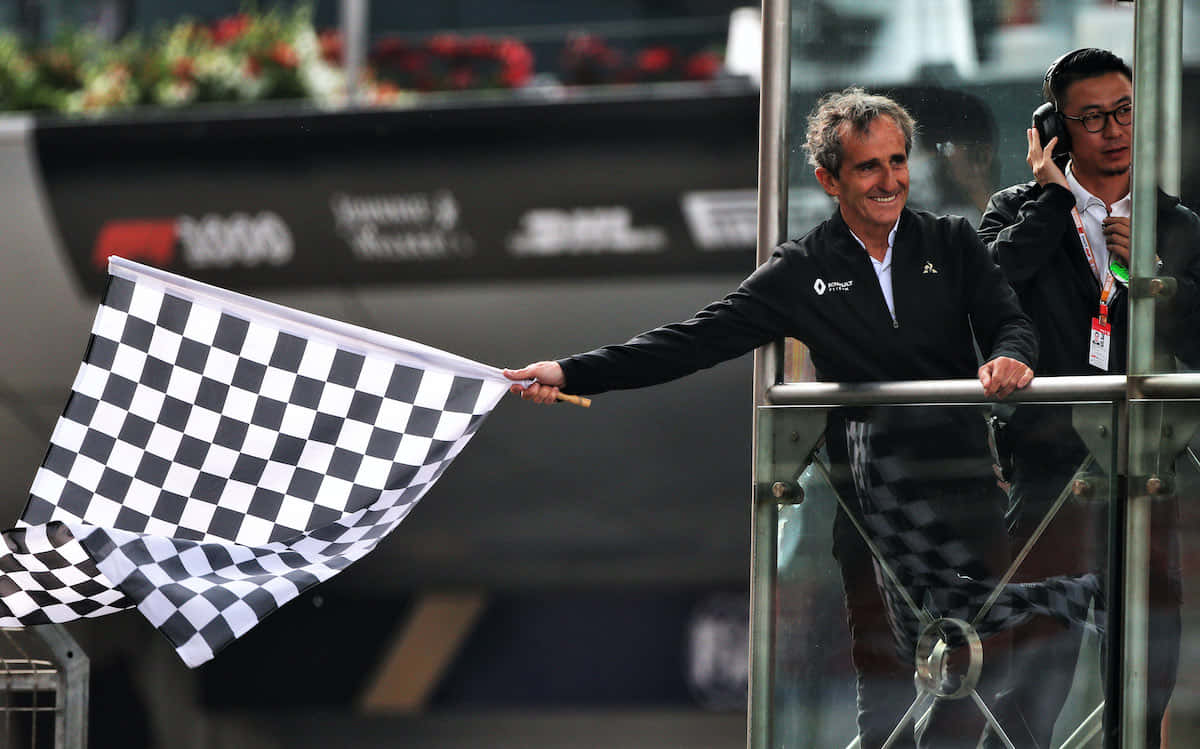 Waving Chequered Flag at the Finish Line Wallpaper