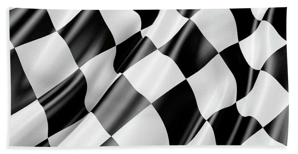 Waving Chequered Flag at Motorsports Event Wallpaper