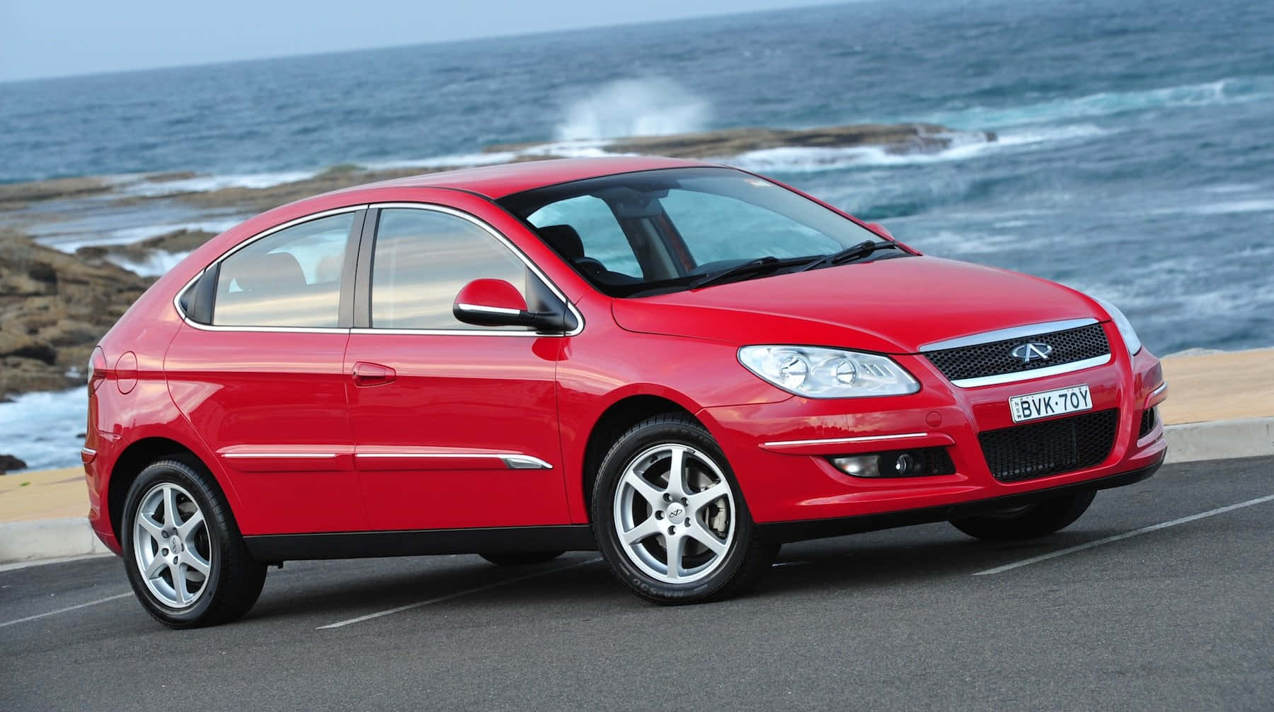 Stylish Red Chery Exeed TXL on the Road Wallpaper