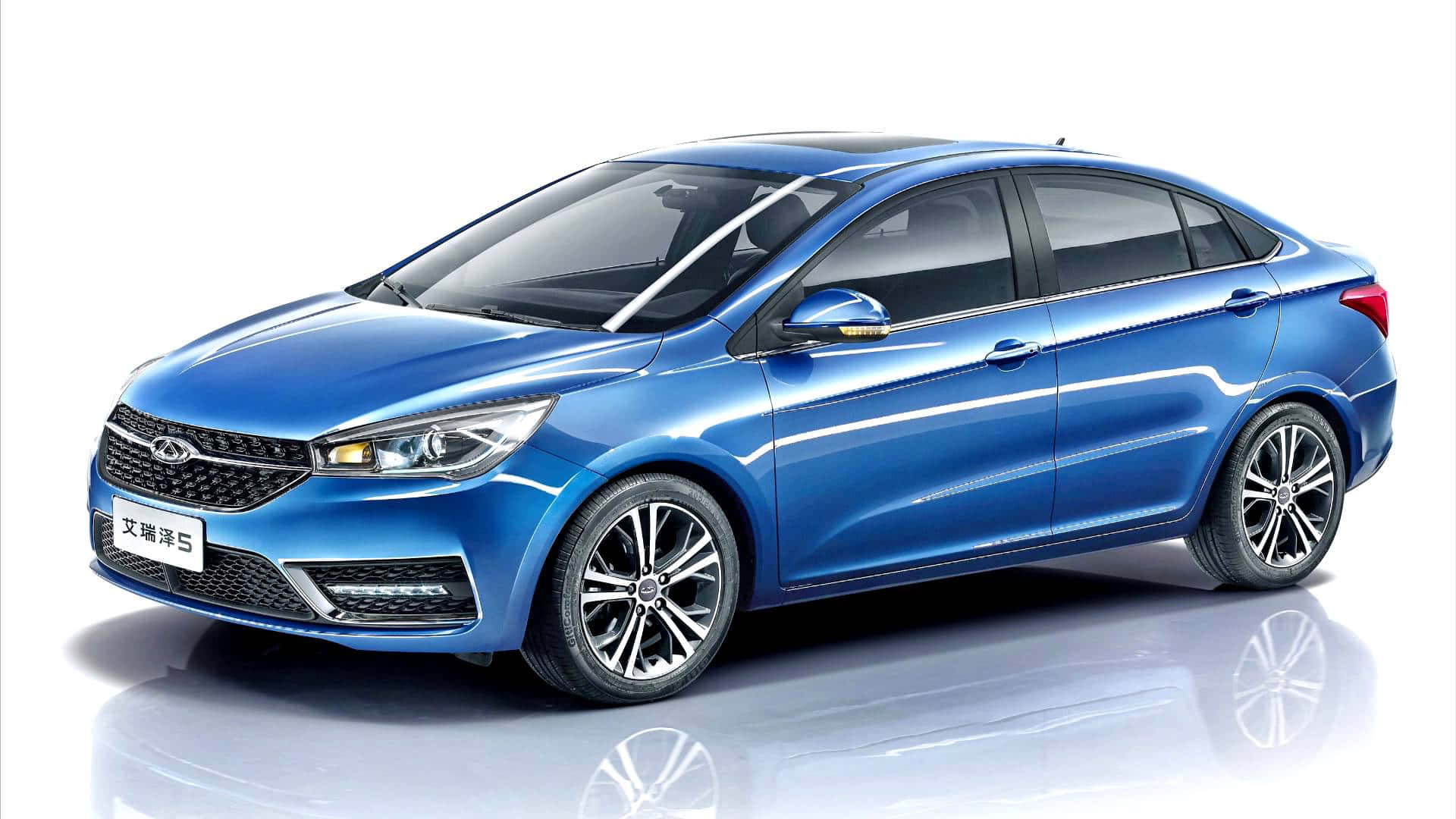 Sleek Chery Car on the Road Wallpaper