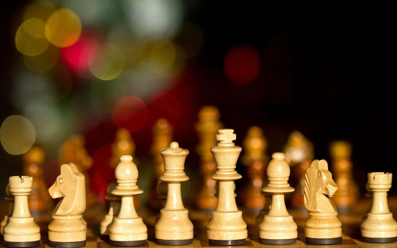 Chess Pieces On A Wooden Board With Bokeh Background