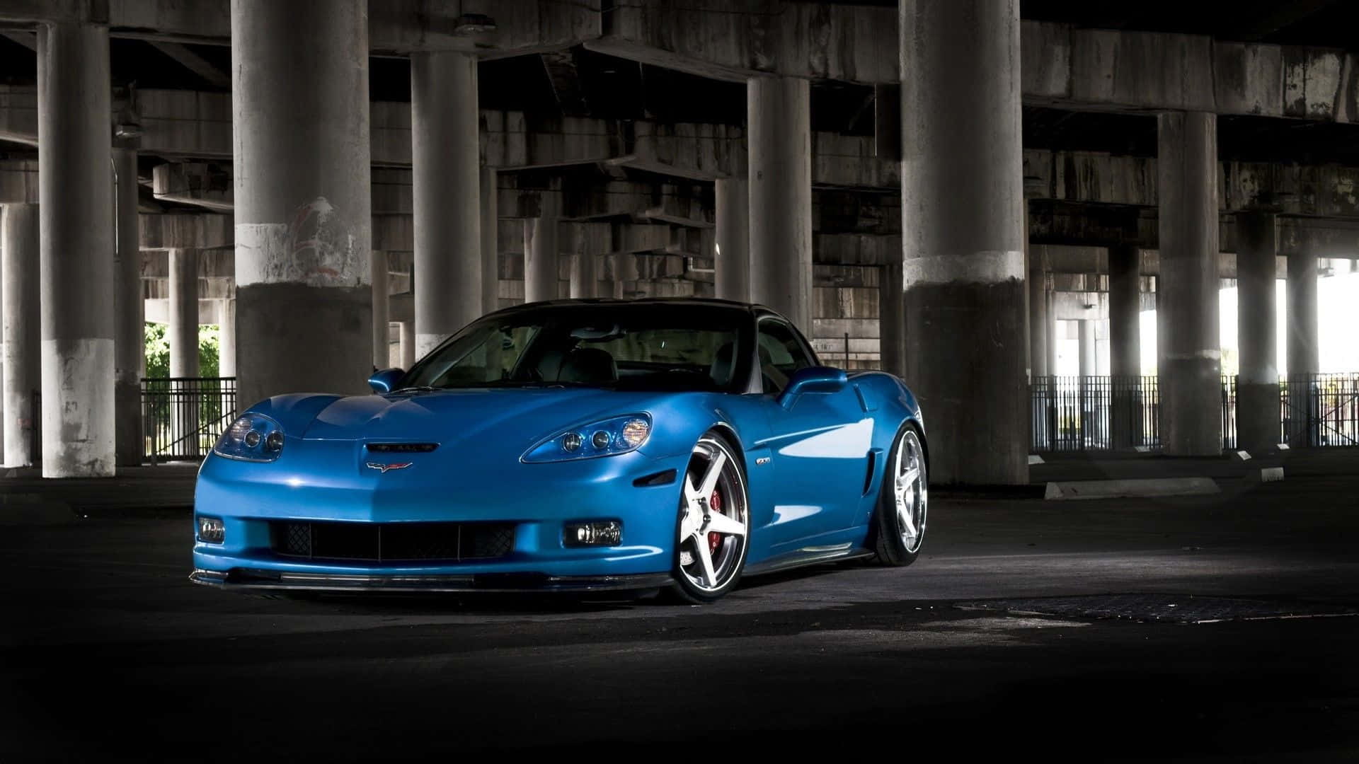 Impresionantechevrolet Corvette Z06 En Acción. Fondo de pantalla