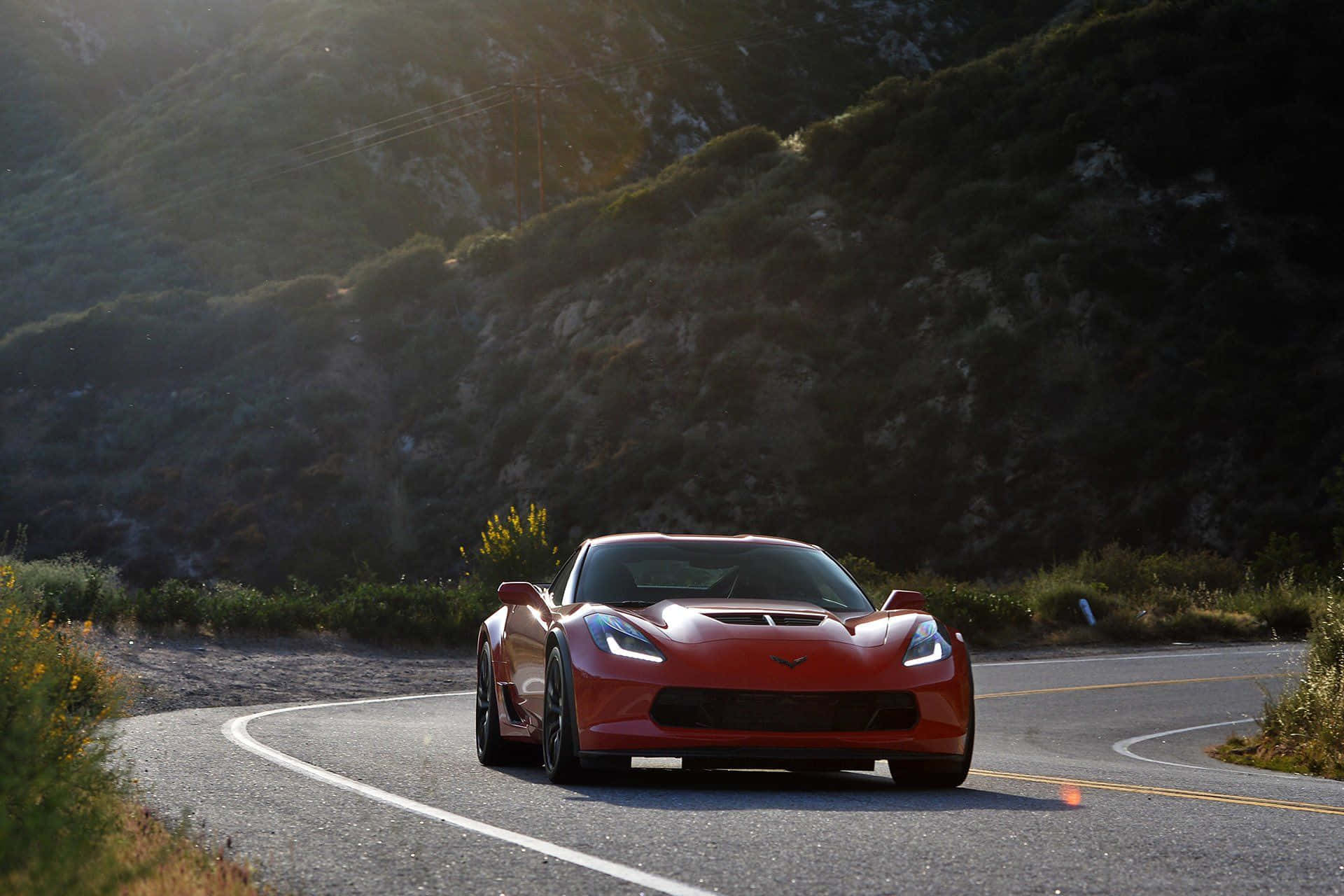 Impresionantechevrolet Corvette Z06 En Acción Fondo de pantalla