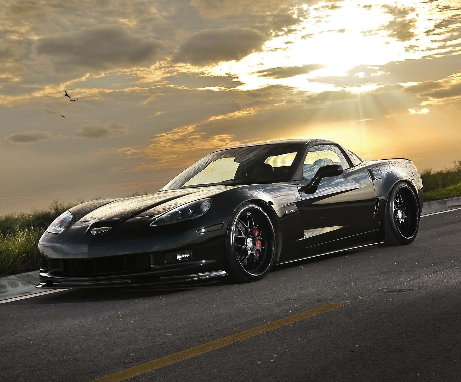 Espectacularchevrolet Corvette Z06 En Acción. Fondo de pantalla