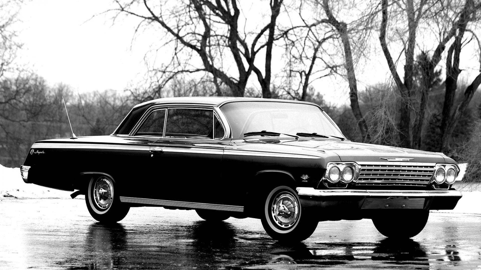 Chevroletimpala 1967 En Invierno. Fondo de pantalla