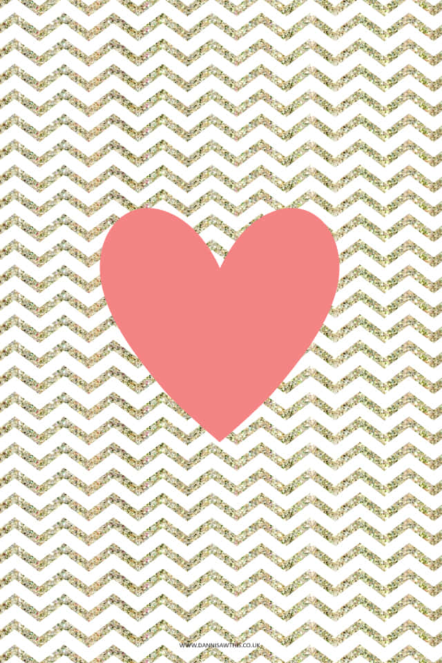 A Pink Heart On A Gold Chevron Background Wallpaper