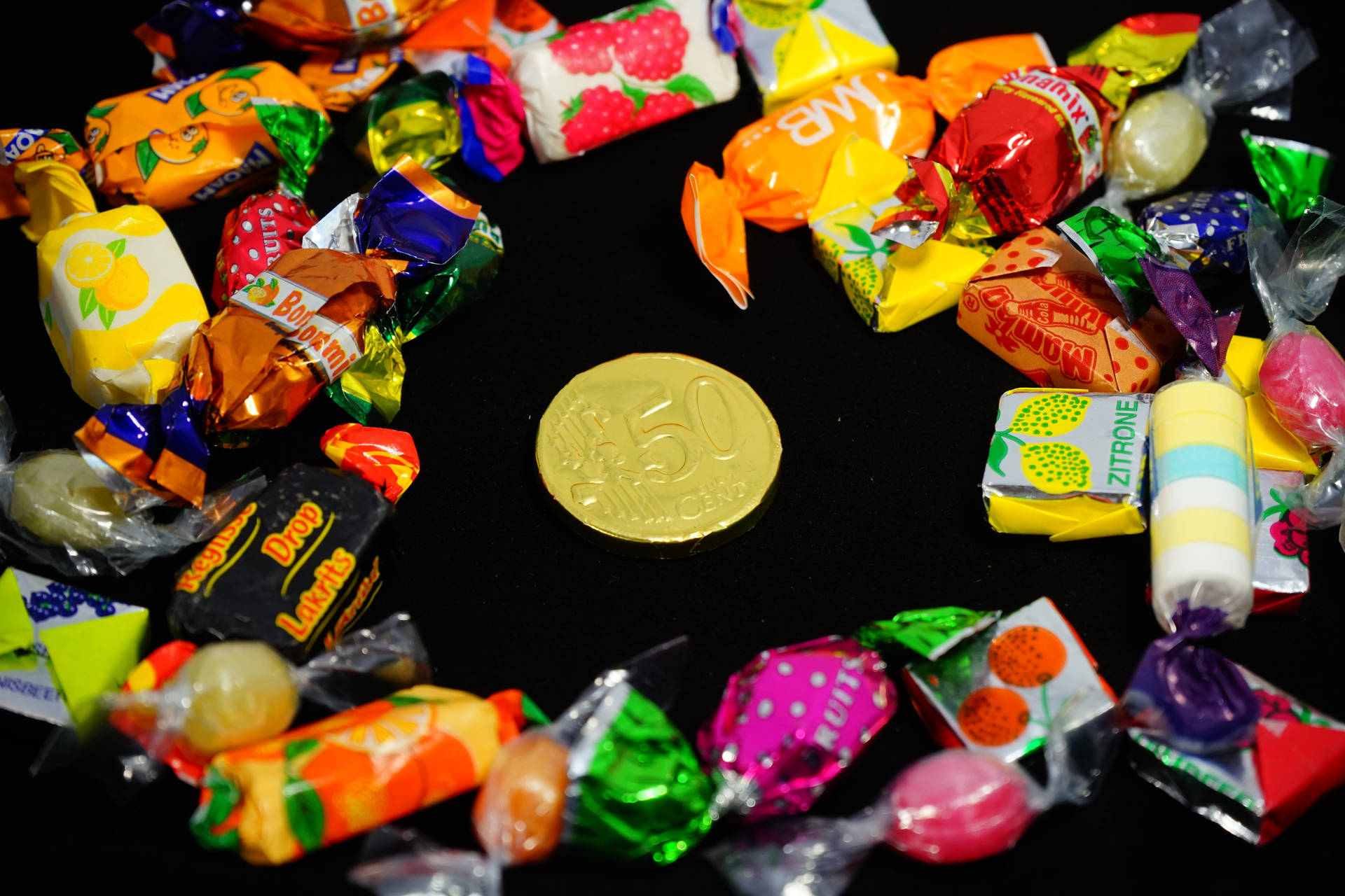 Chewy Candies And Gold Coin Wallpaper