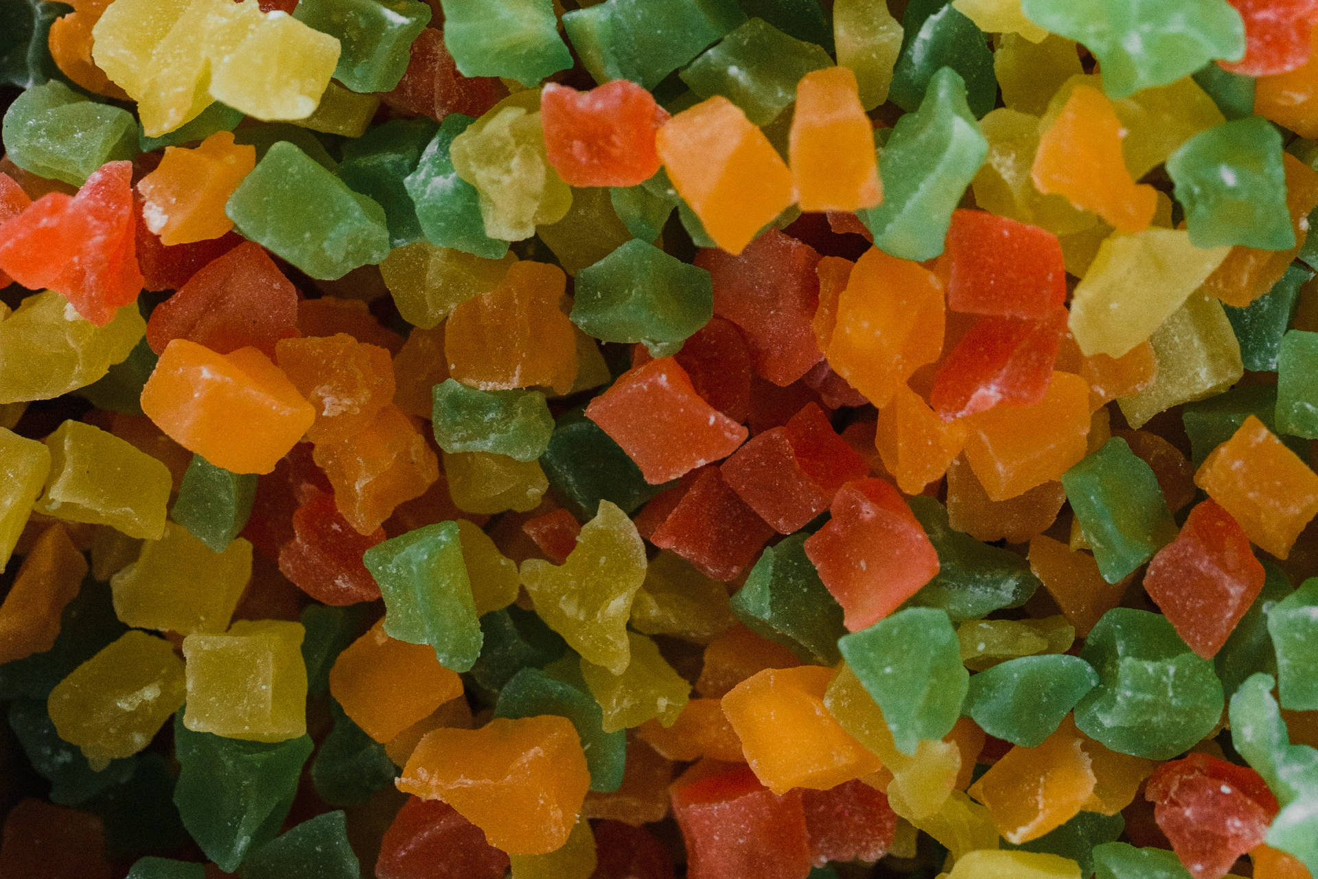 A handful of colorful chewy crystal candies Wallpaper