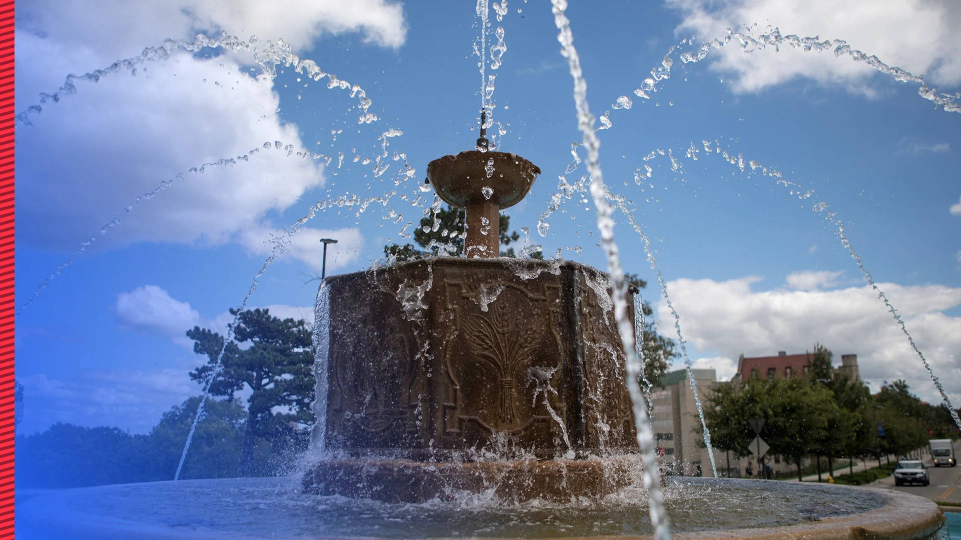 Caption: The Majestic Chi Omega Fountain at the University of Kansas Wallpaper