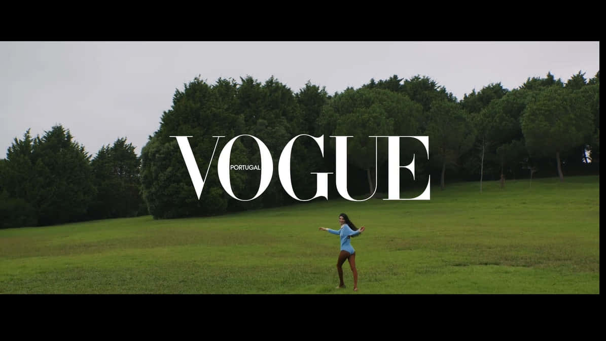 Chic Elegance Symbolized In Vogue Logo Wallpaper