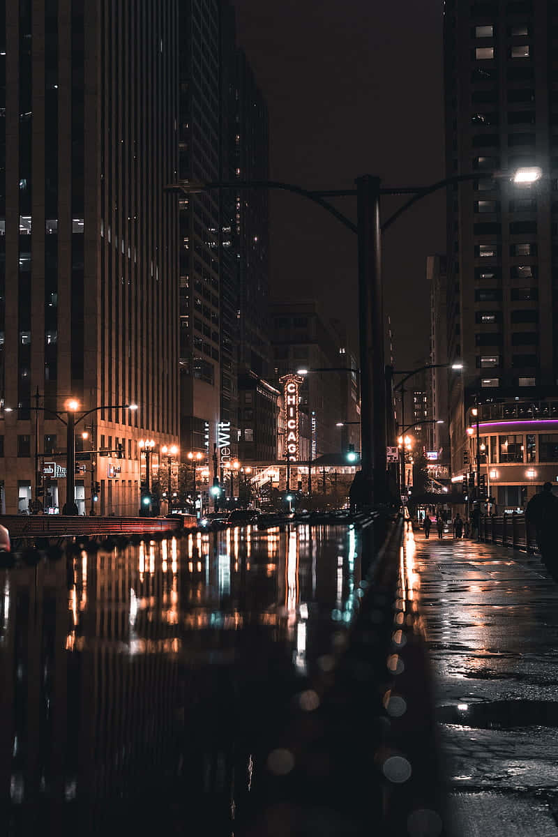 Tag ind de vidunderlige lys af Chicago City om natten Wallpaper